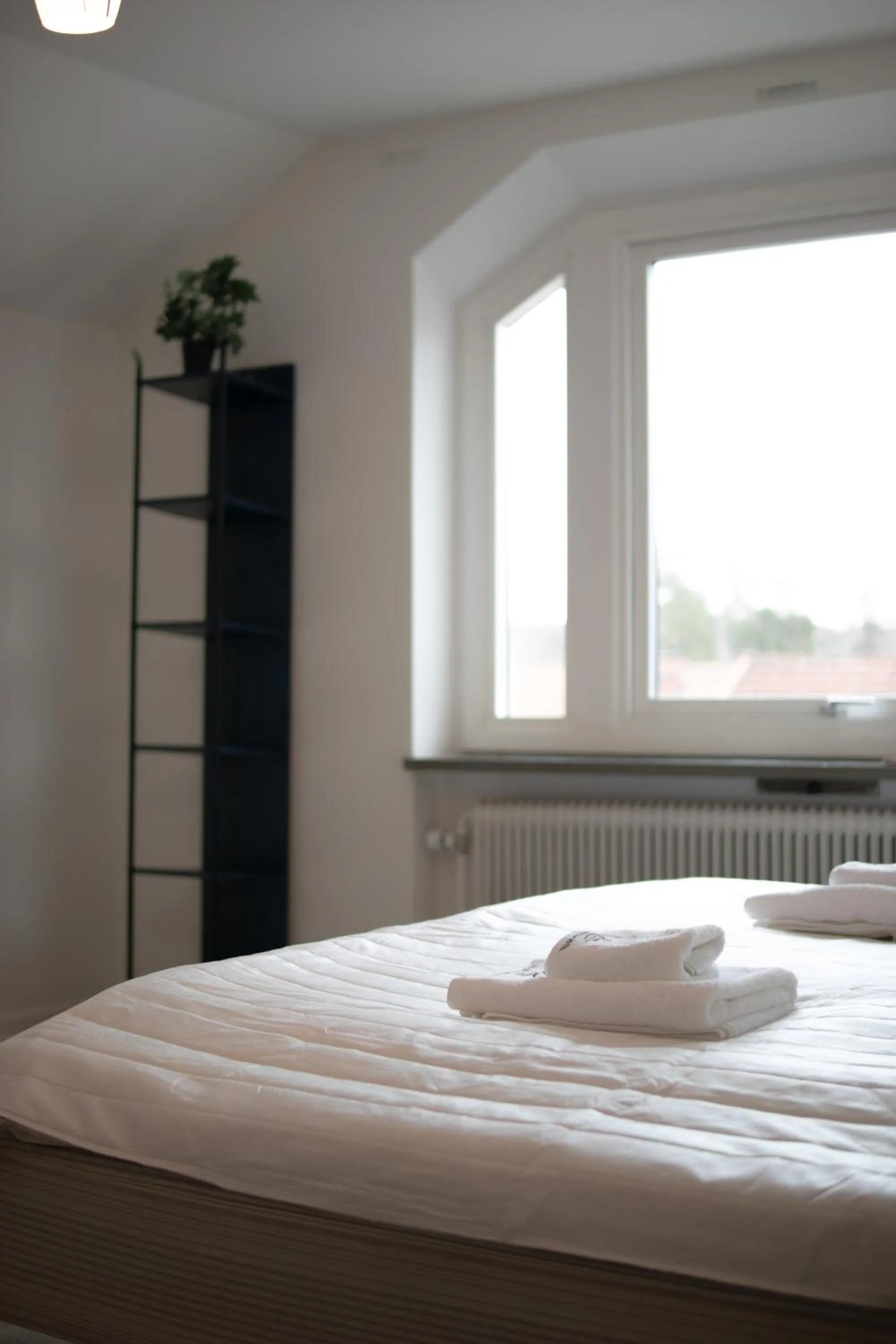 Bed in Säffle Suites by Svaneholm Hotel