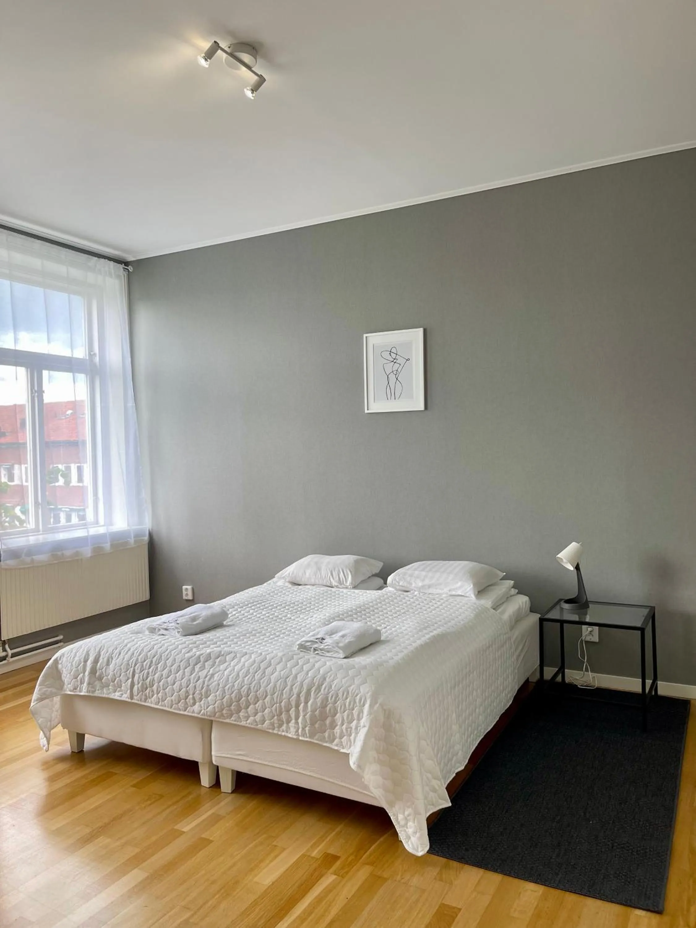 Bed in Säffle Suites by Svaneholm Hotel