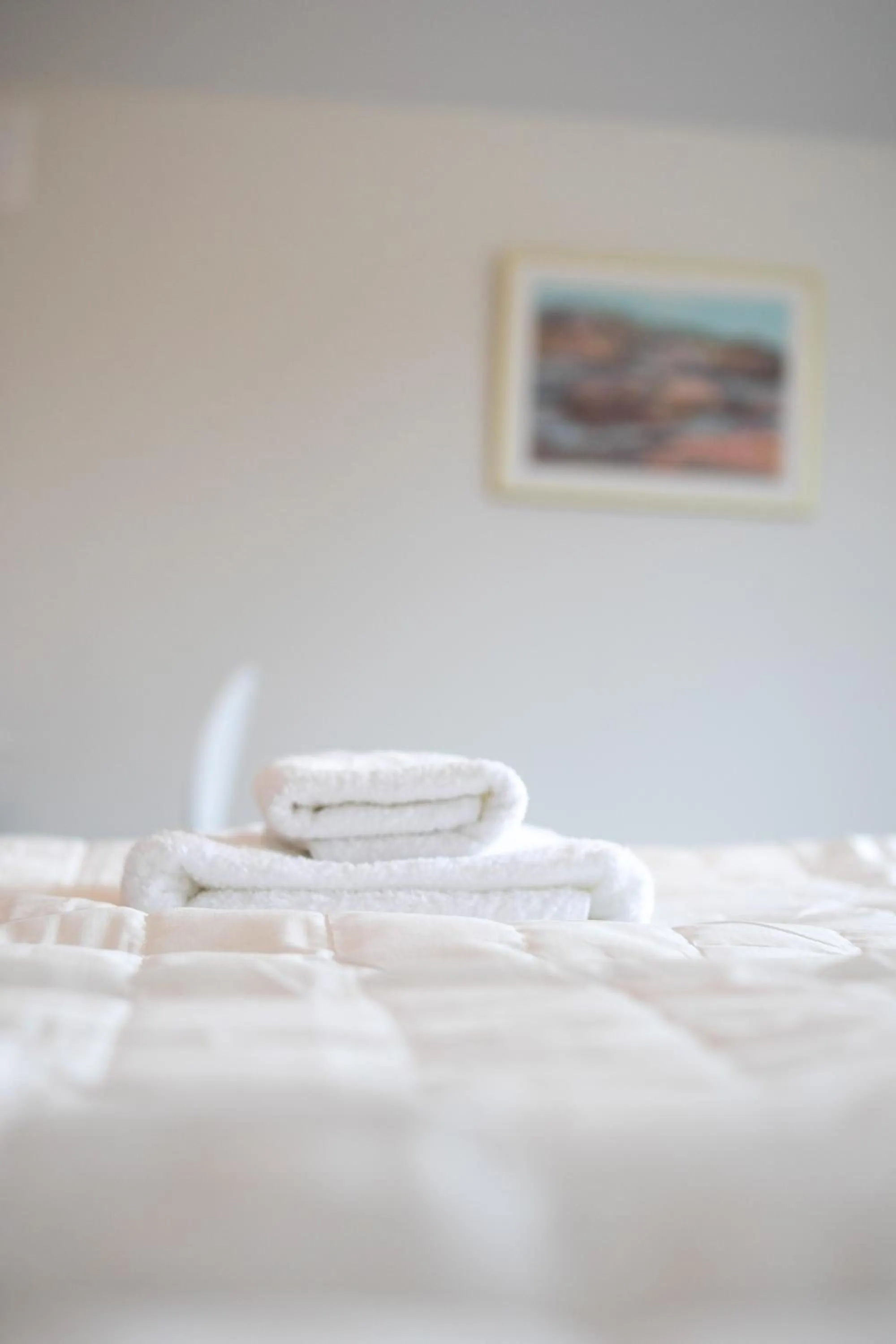 Bed in Säffle Suites by Svaneholm Hotel