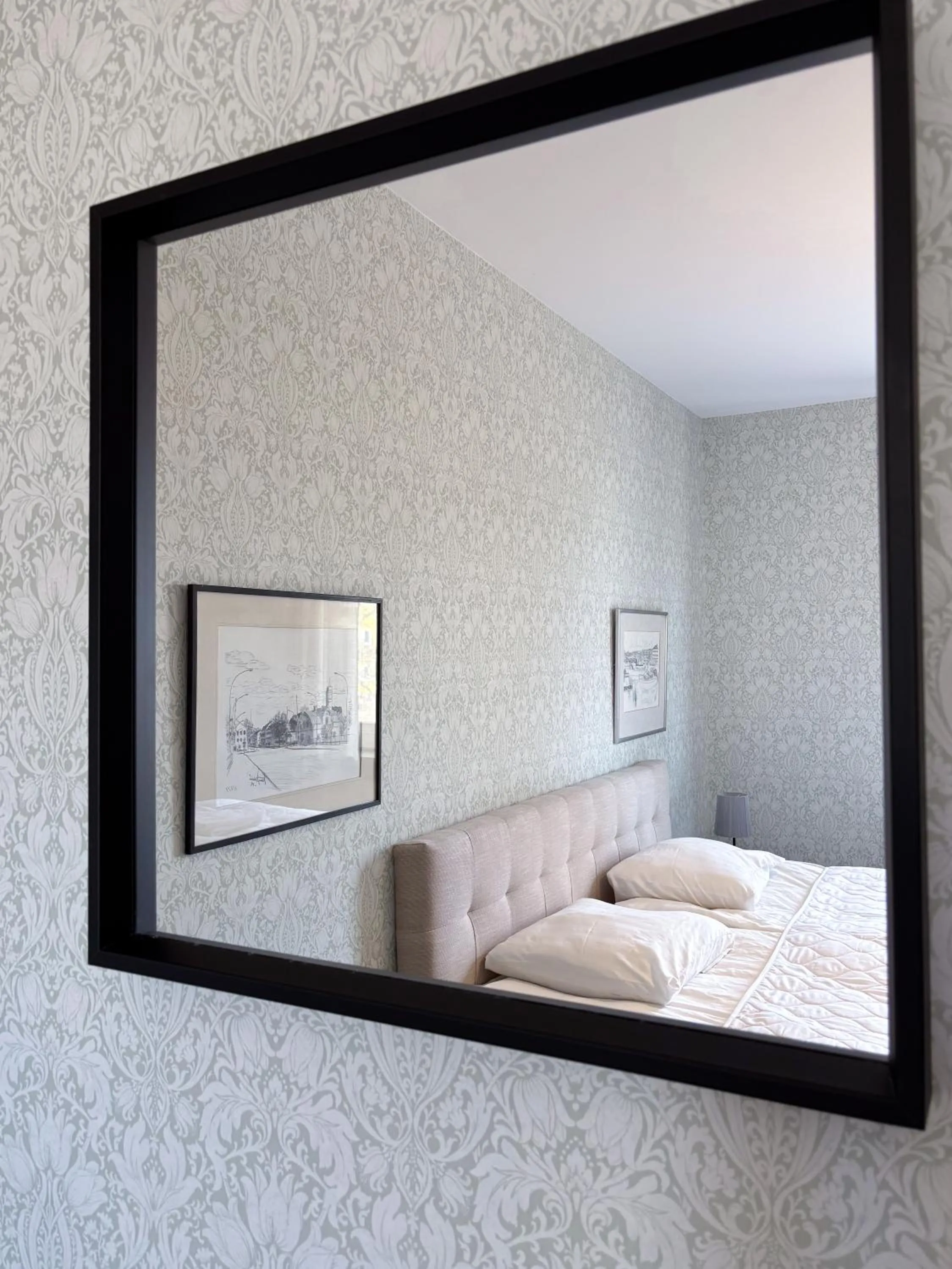 Bed in Säffle Suites by Svaneholm Hotel