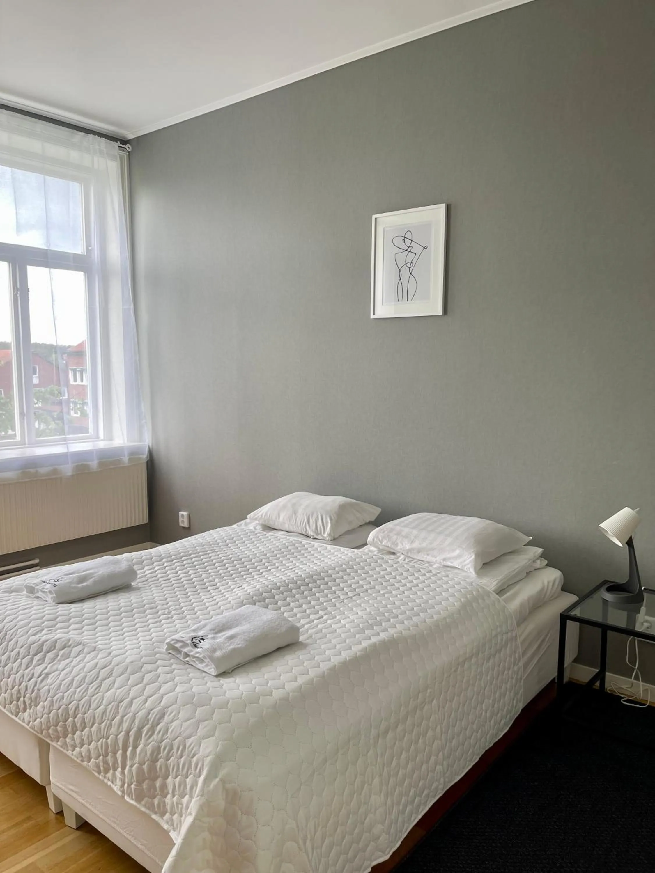 Bed in Säffle Suites by Svaneholm Hotel