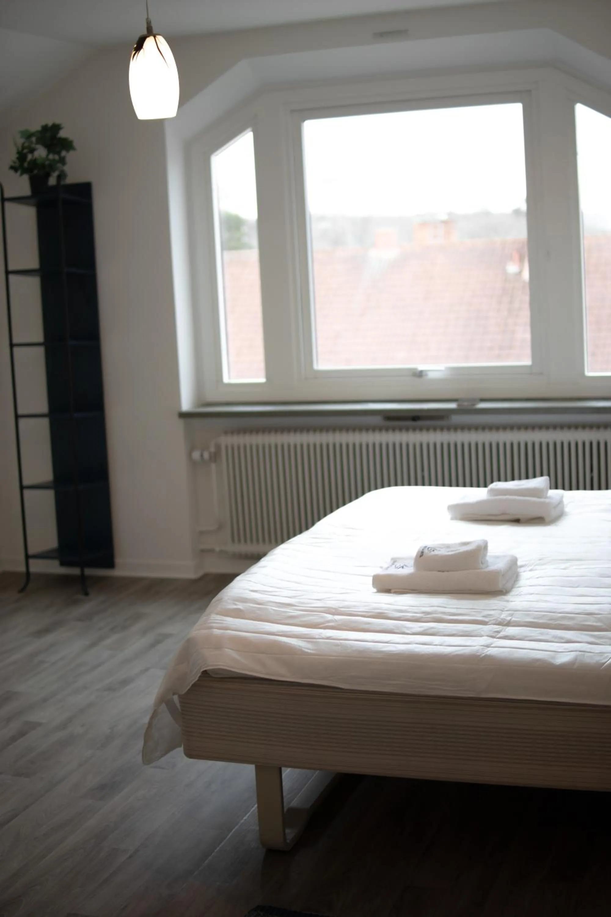 Bed in Säffle Suites by Svaneholm Hotel