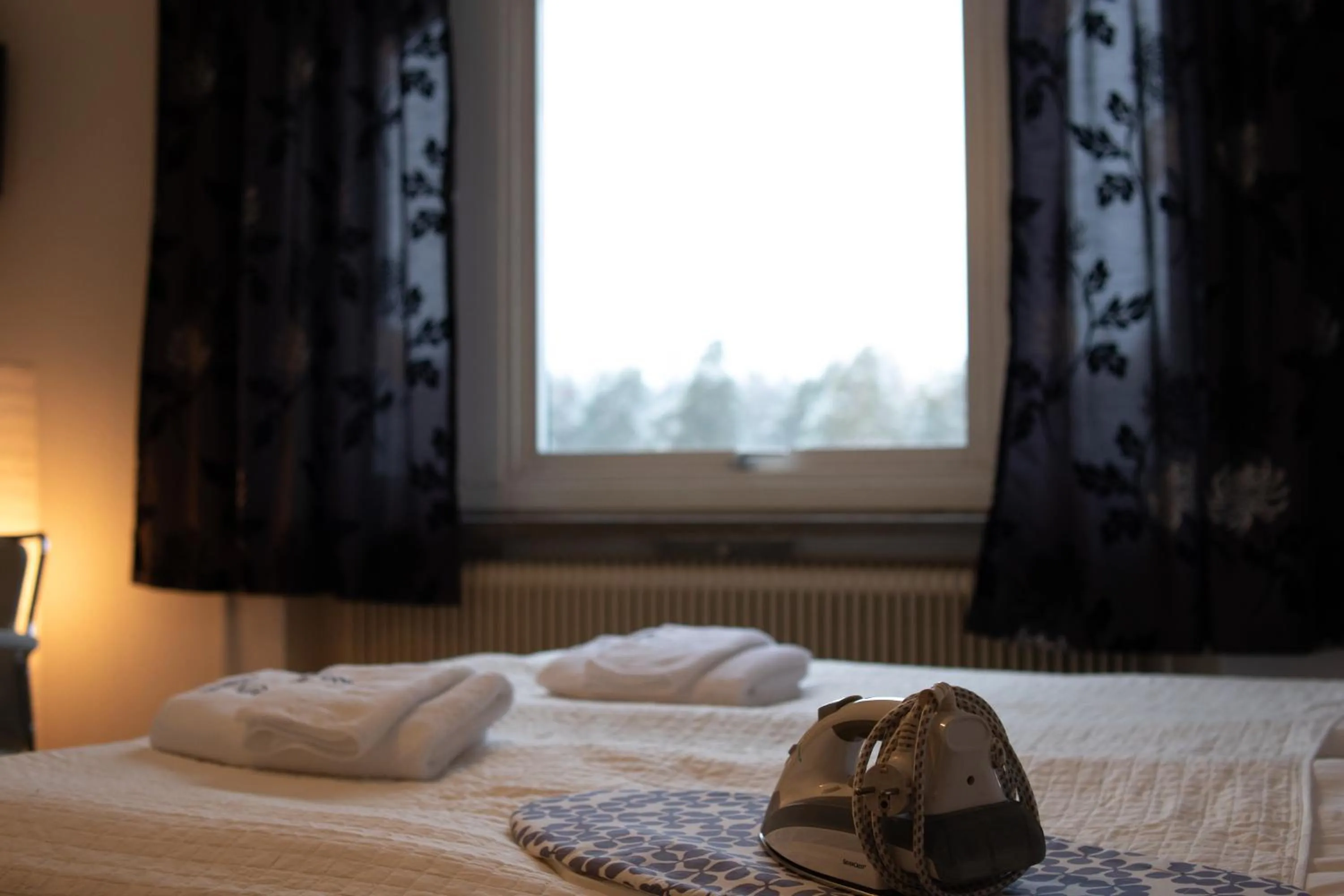 Bed in Säffle Suites by Svaneholm Hotel