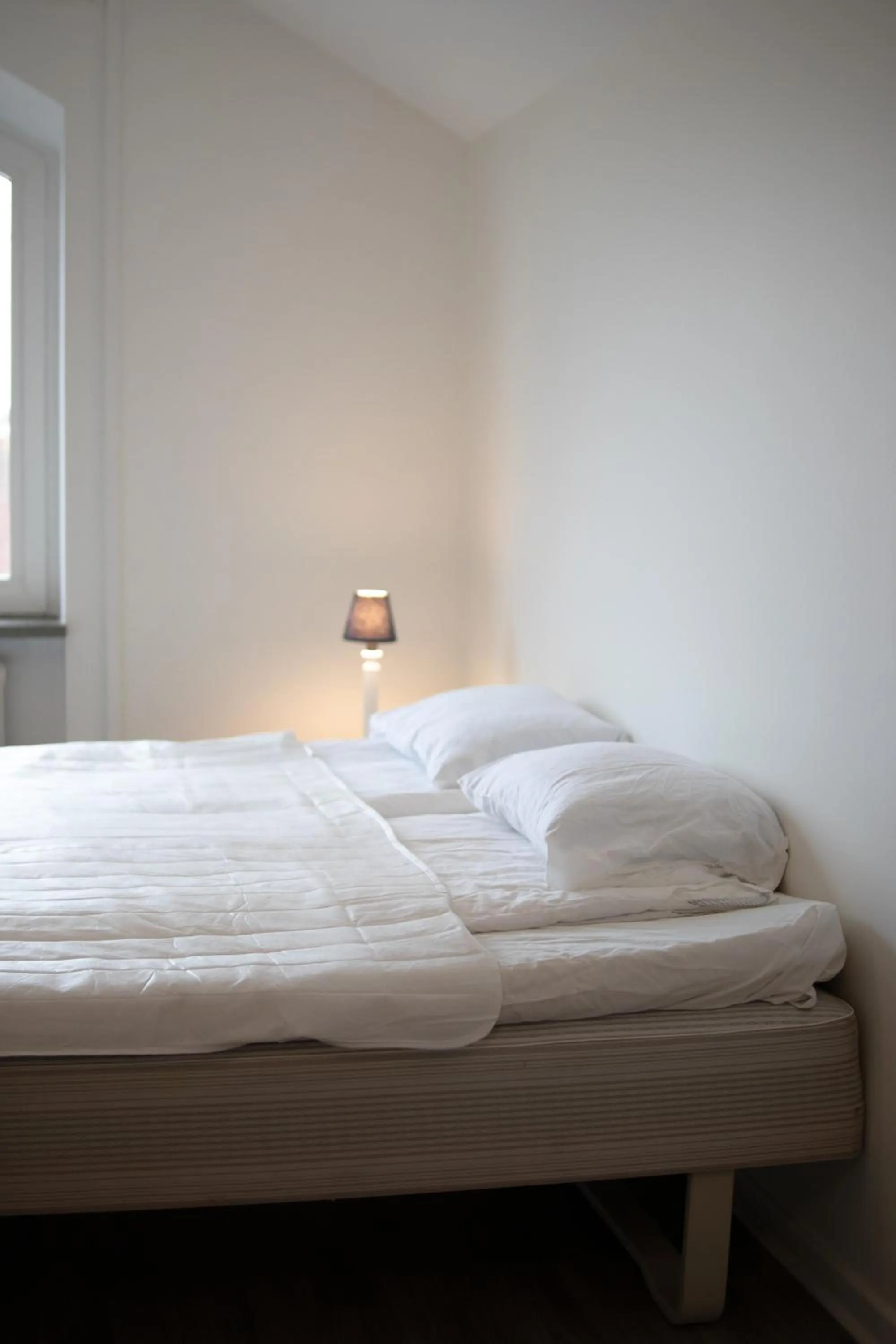 Bed in Säffle Suites by Svaneholm Hotel