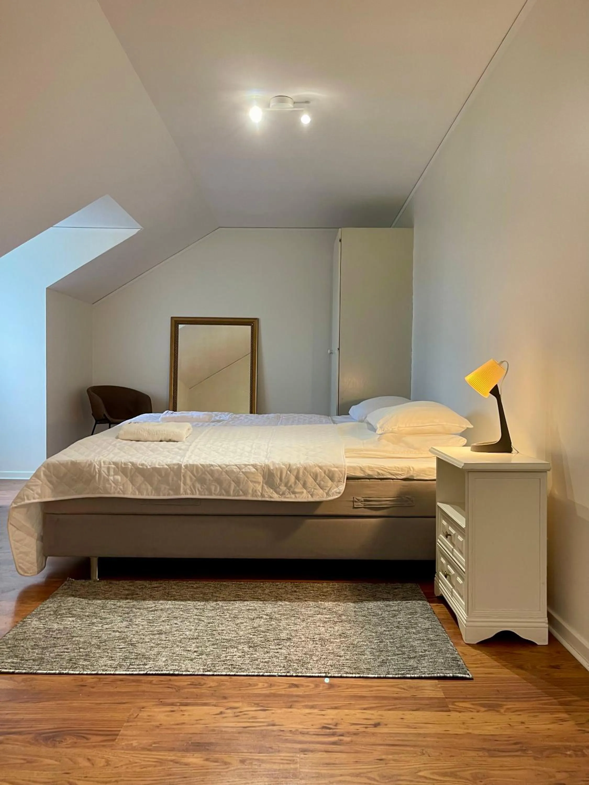 Bed in Säffle Suites by Svaneholm Hotel