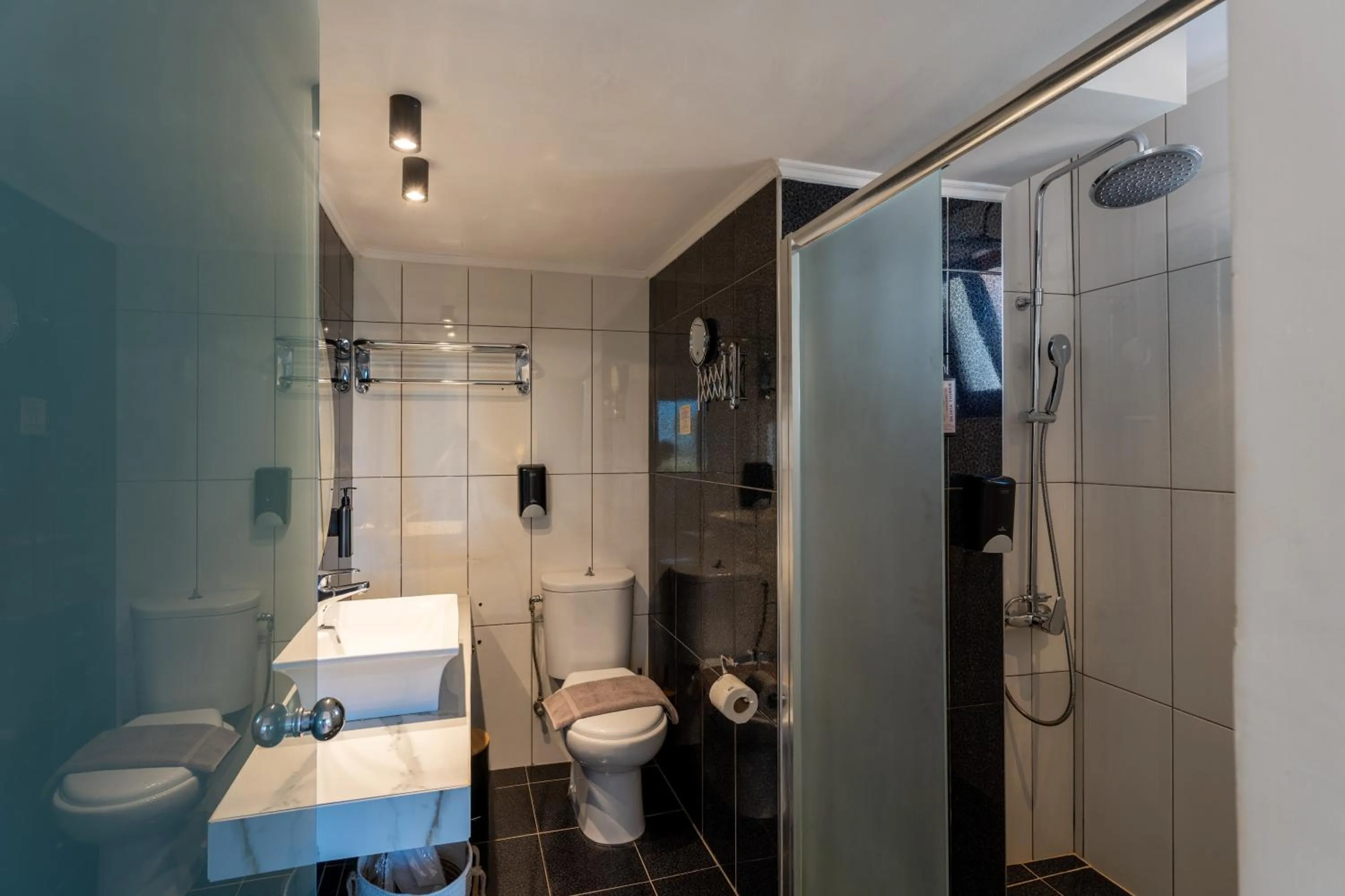 Shower in Georgia's Garden by Omilos Hotels