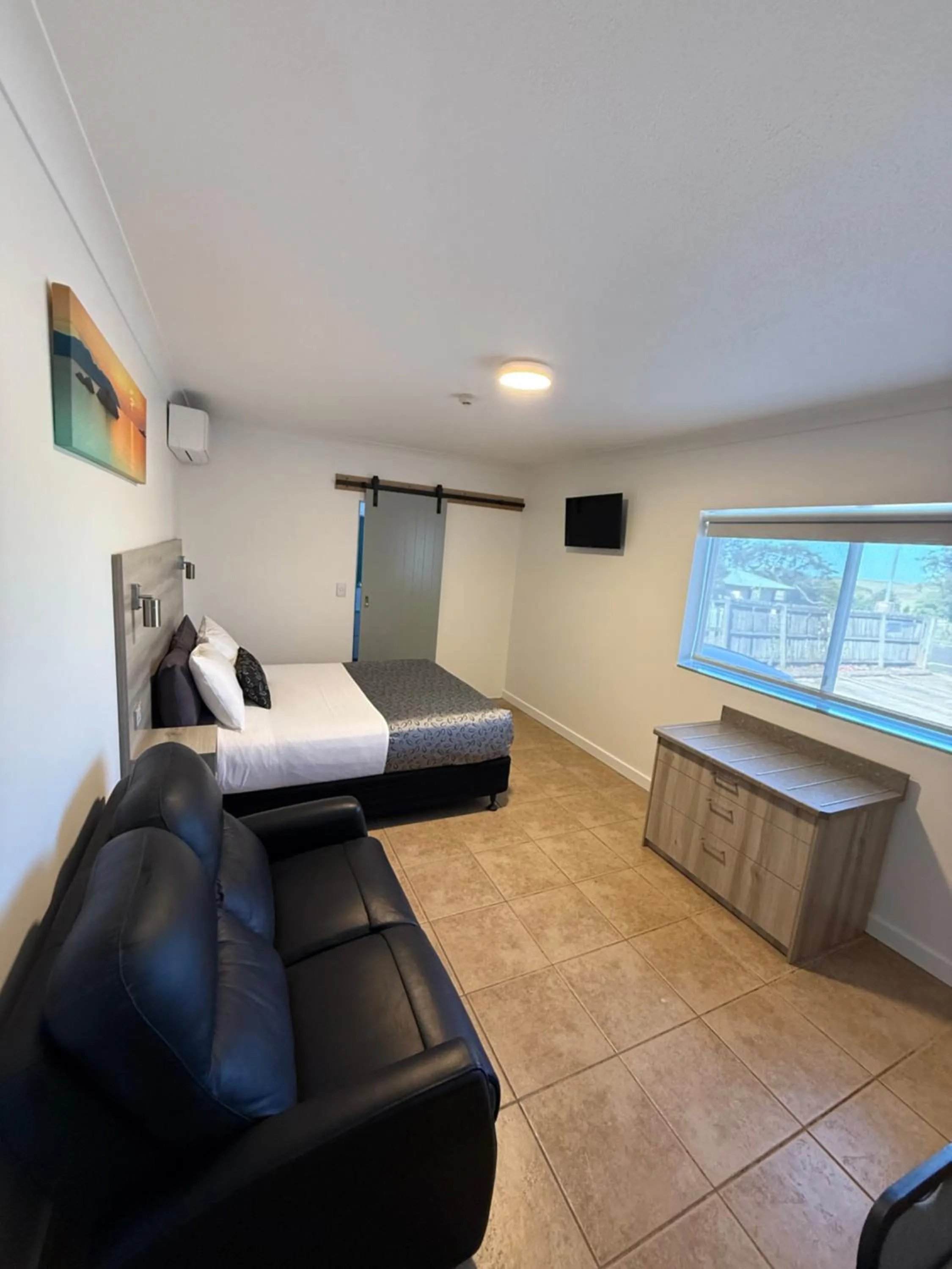 Bed in Childers Oasis Motel