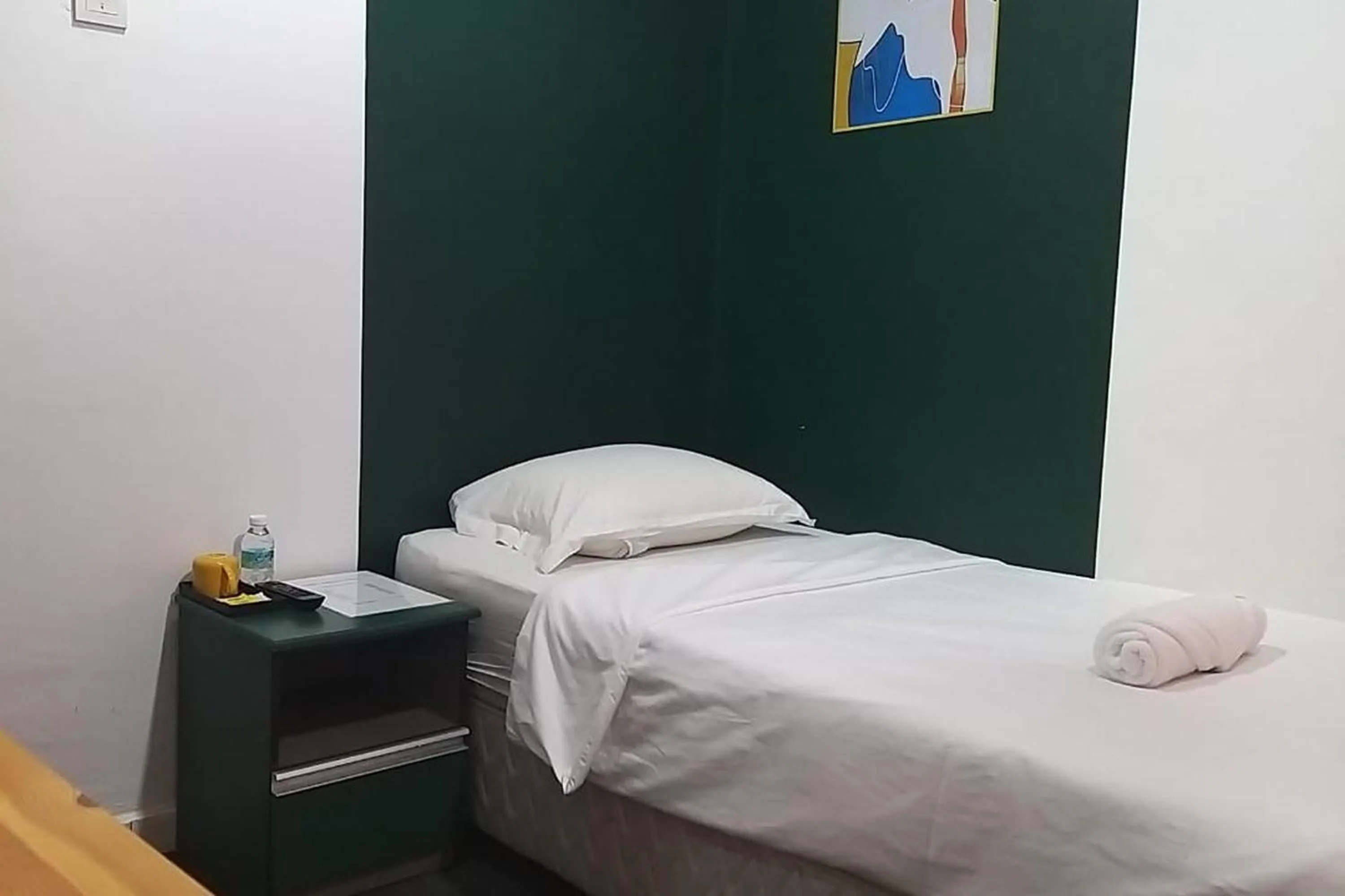 Bed in BR Parklands Hotel