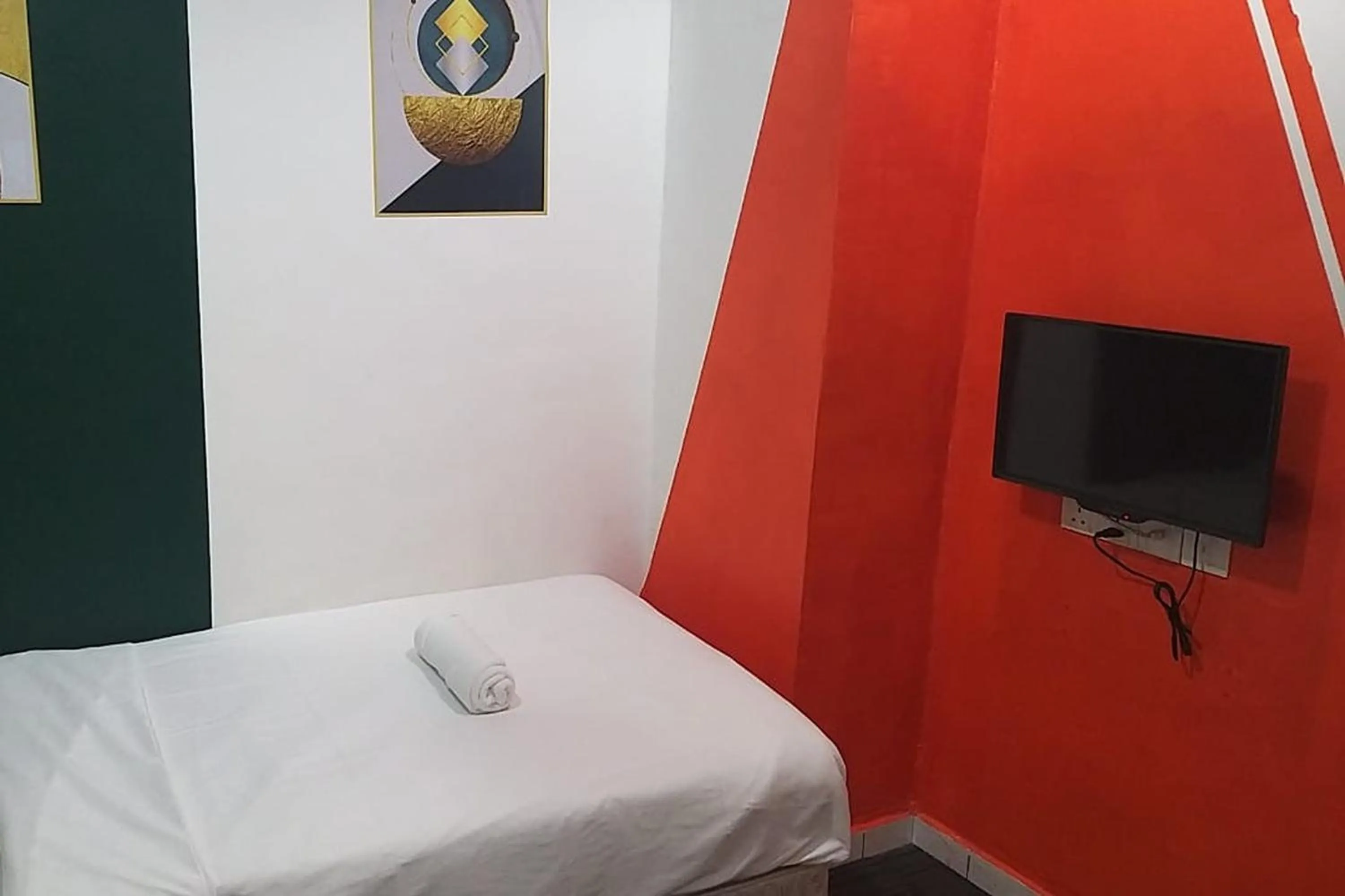 Bed in BR Parklands Hotel