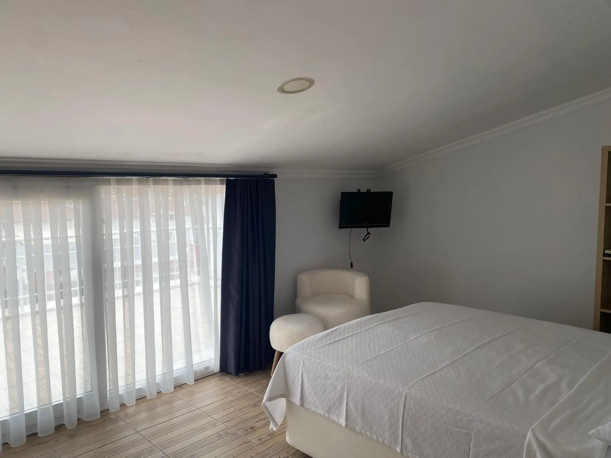 Bed in Bouvardia Inn