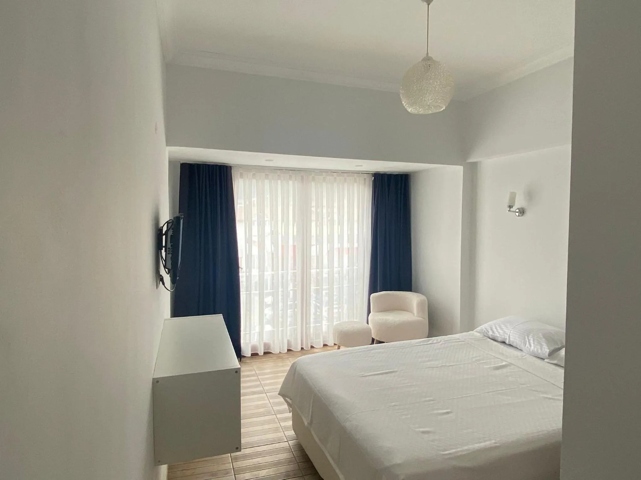 Bed in Bouvardia Inn