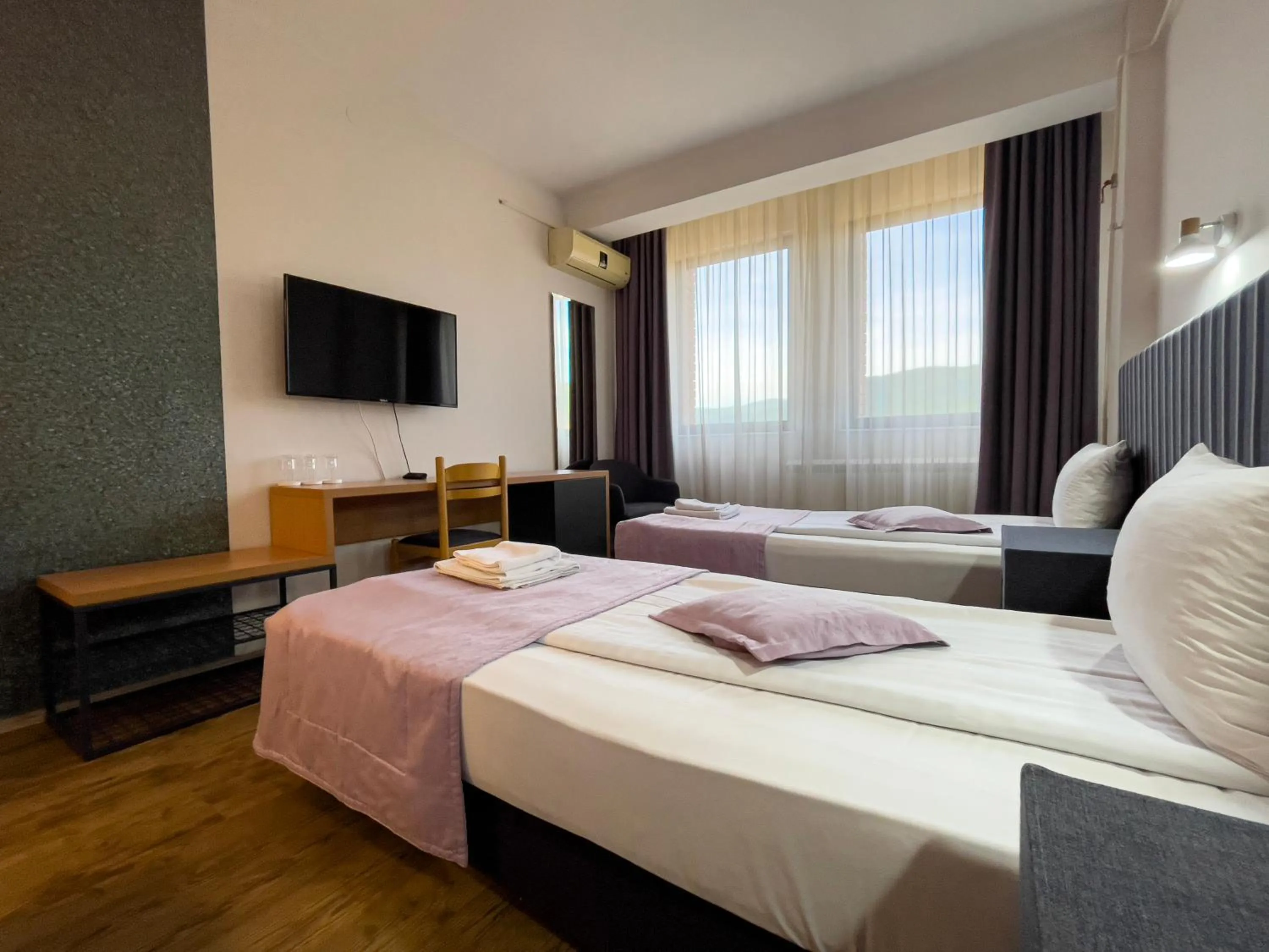 Bed in Zepter Hotel Drina Bajina Basta, member of Zepter Hotels