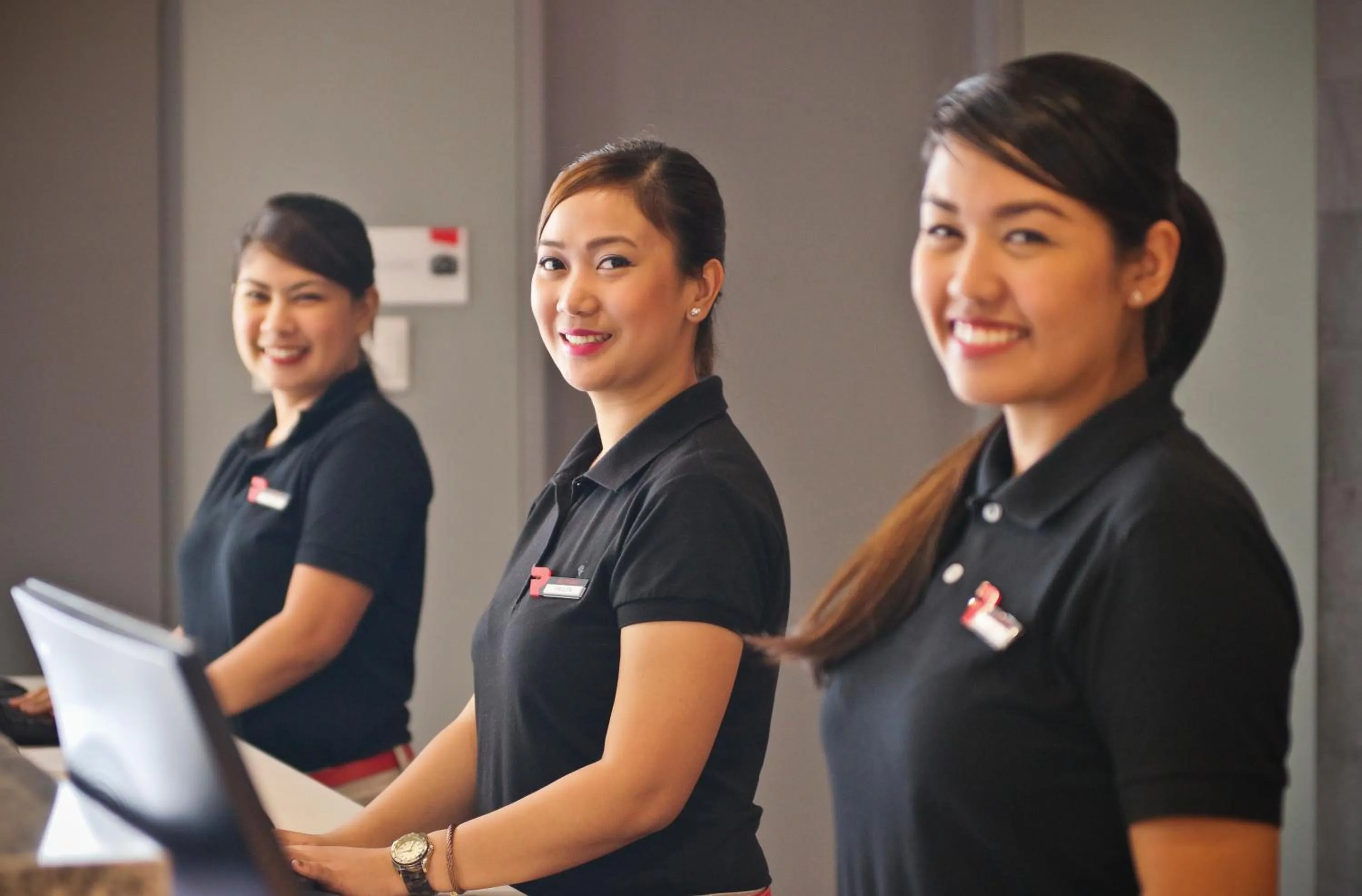 Staff in Red Planet Makati Amorsolo