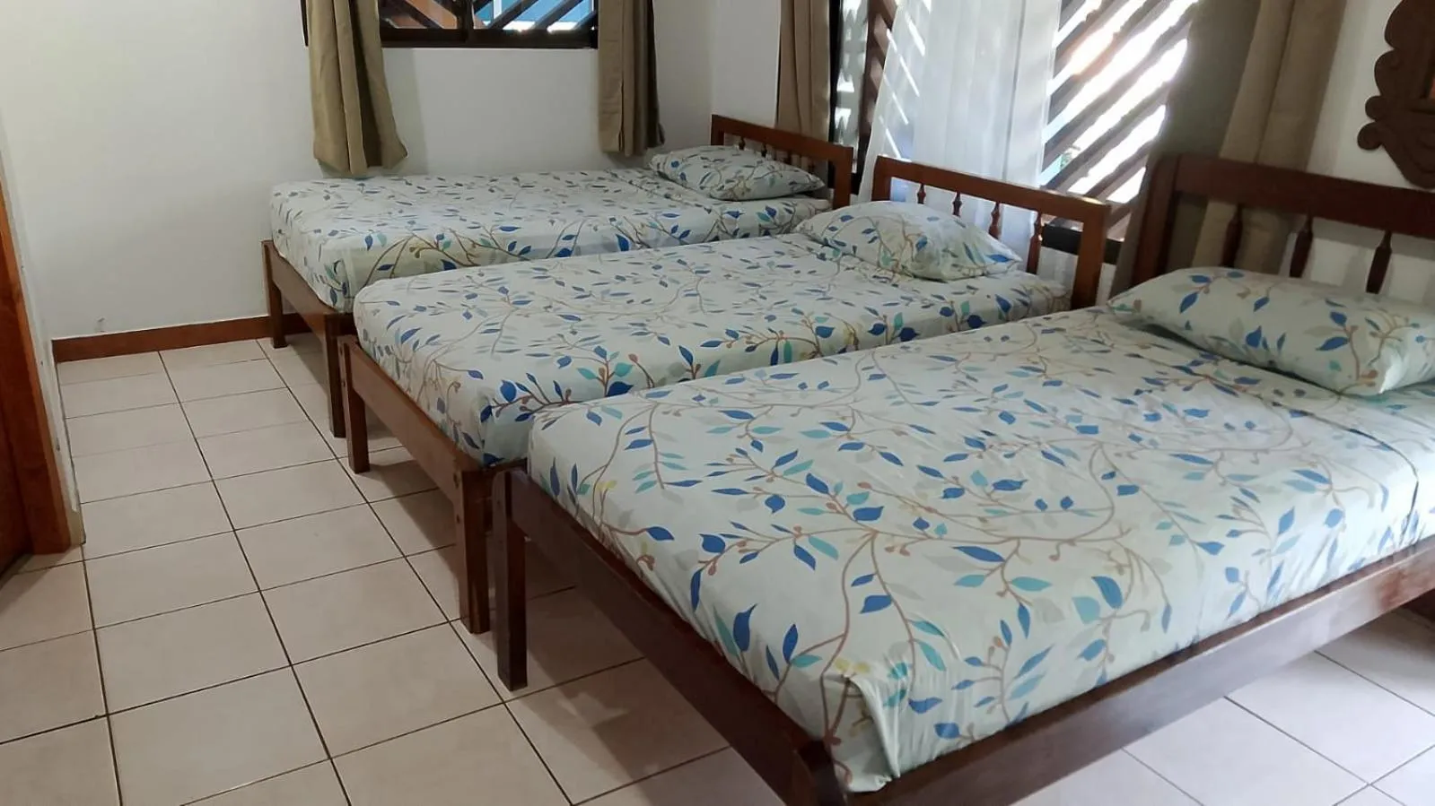 Bed in Hotel Marielos Tamarindo