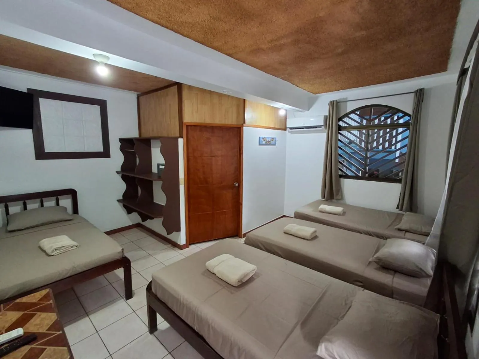 Bed in Hotel Marielos Tamarindo