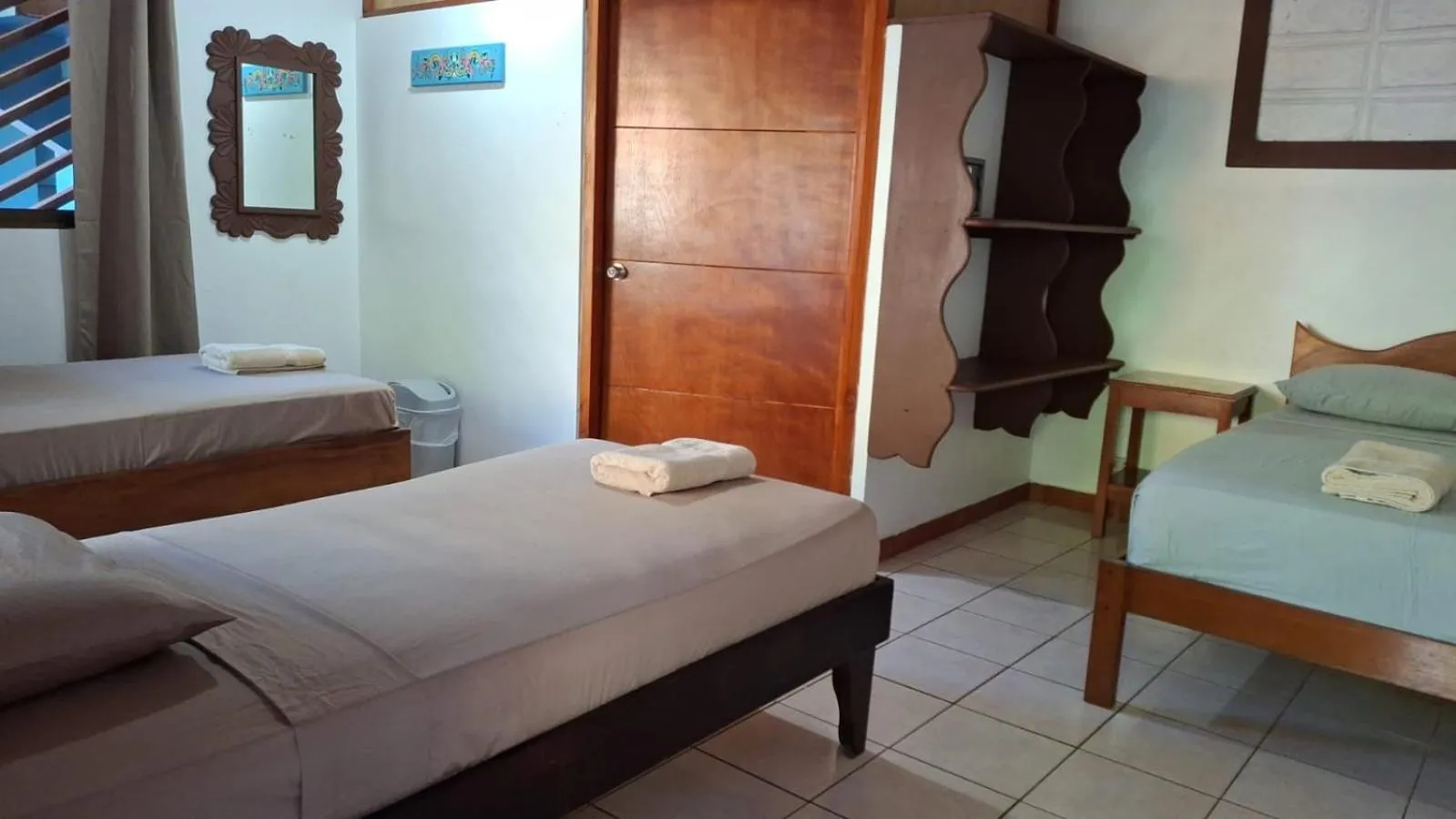Bed in Hotel Marielos Tamarindo