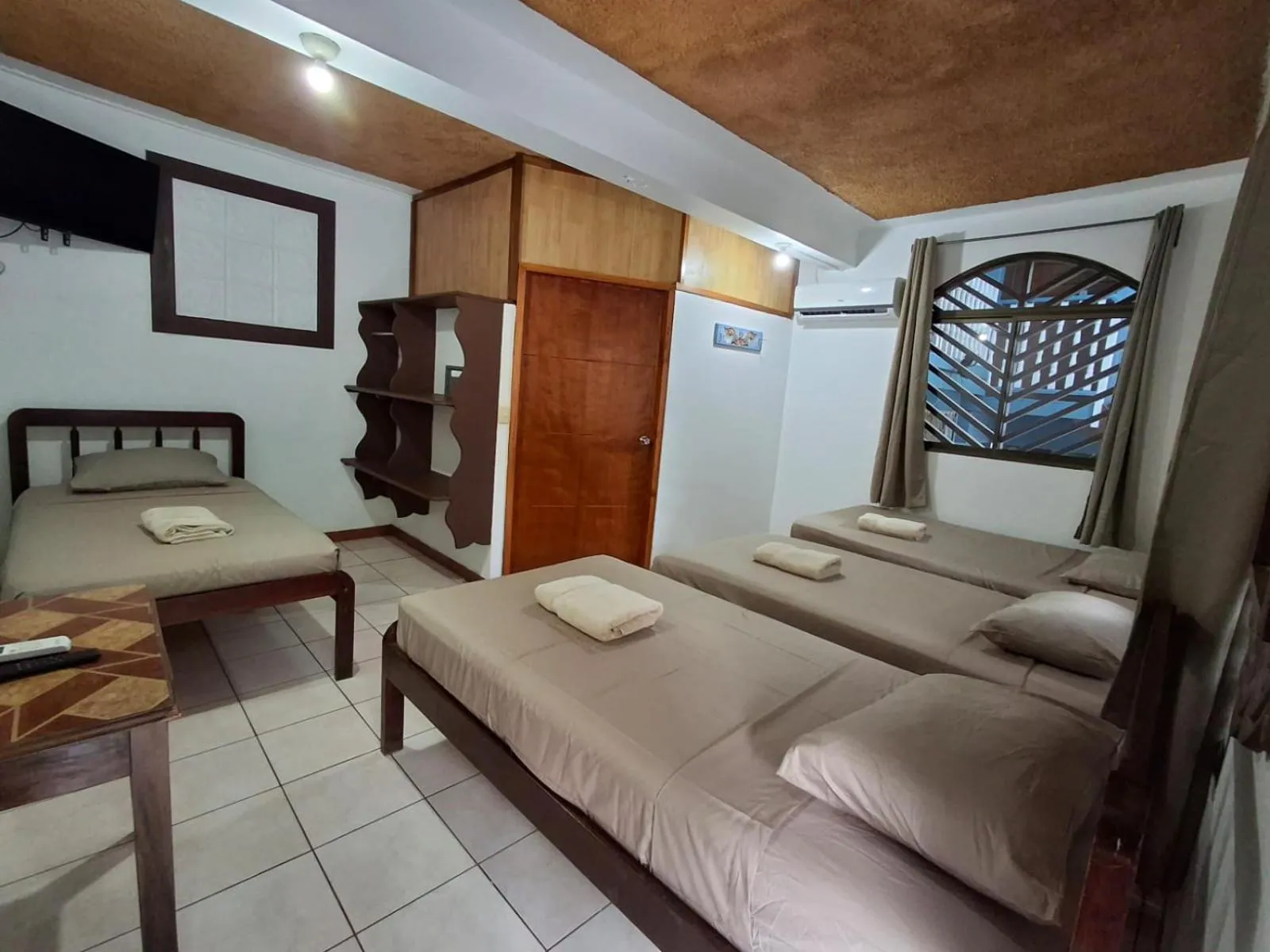 Bed in Hotel Marielos Tamarindo