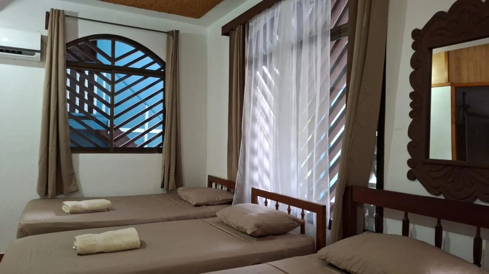 Bed in Hotel Marielos Tamarindo