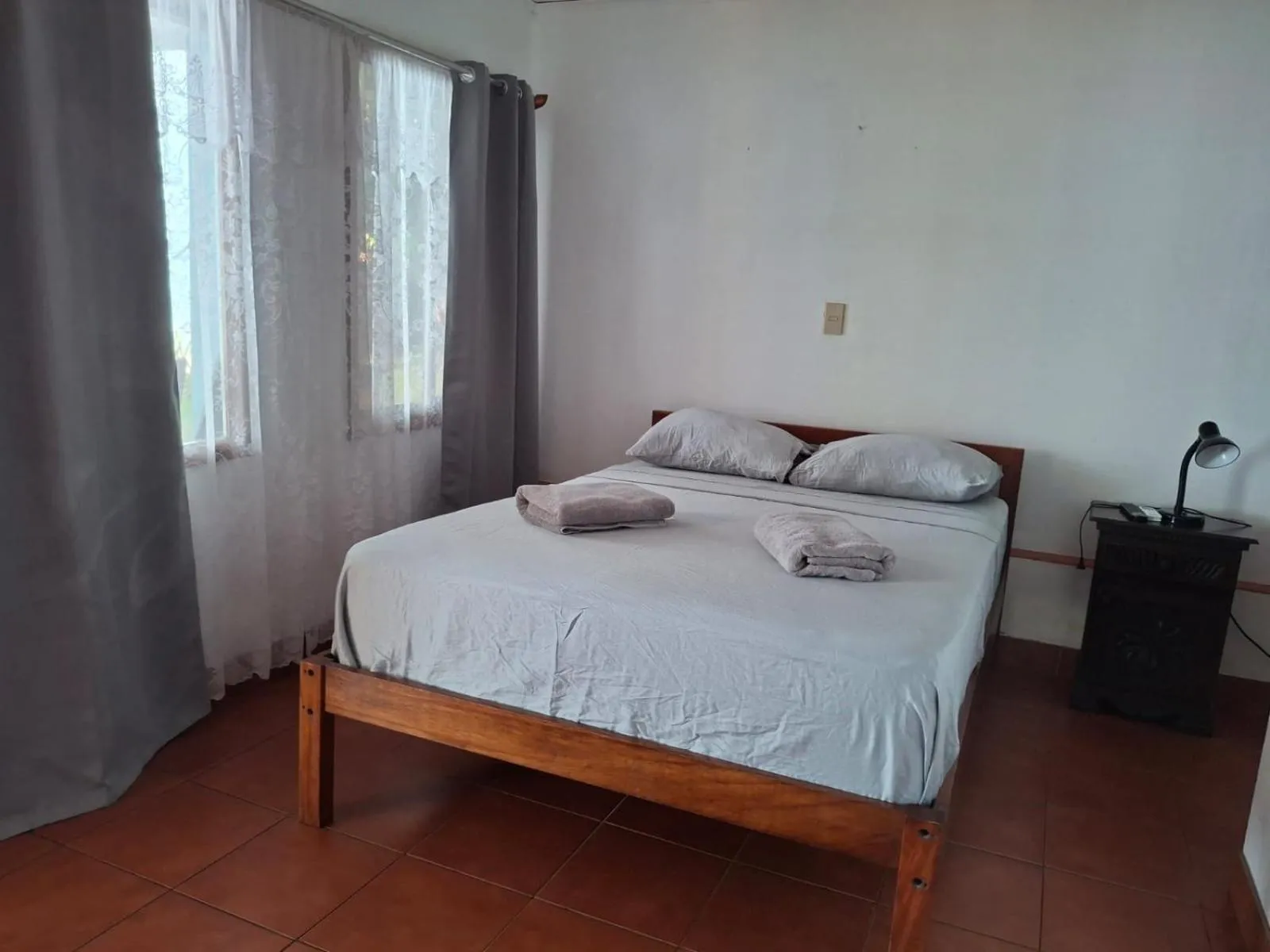 Bed in Hotel Marielos Tamarindo