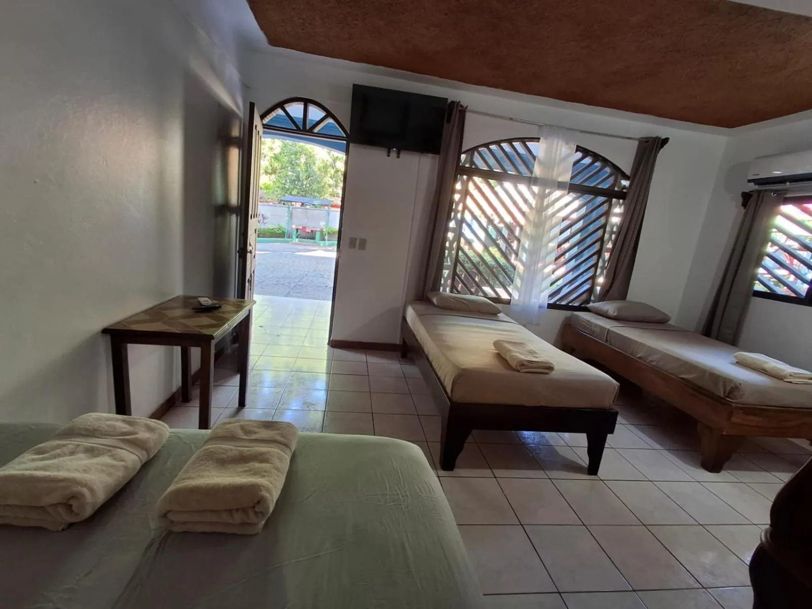 Bed in Hotel Marielos Tamarindo