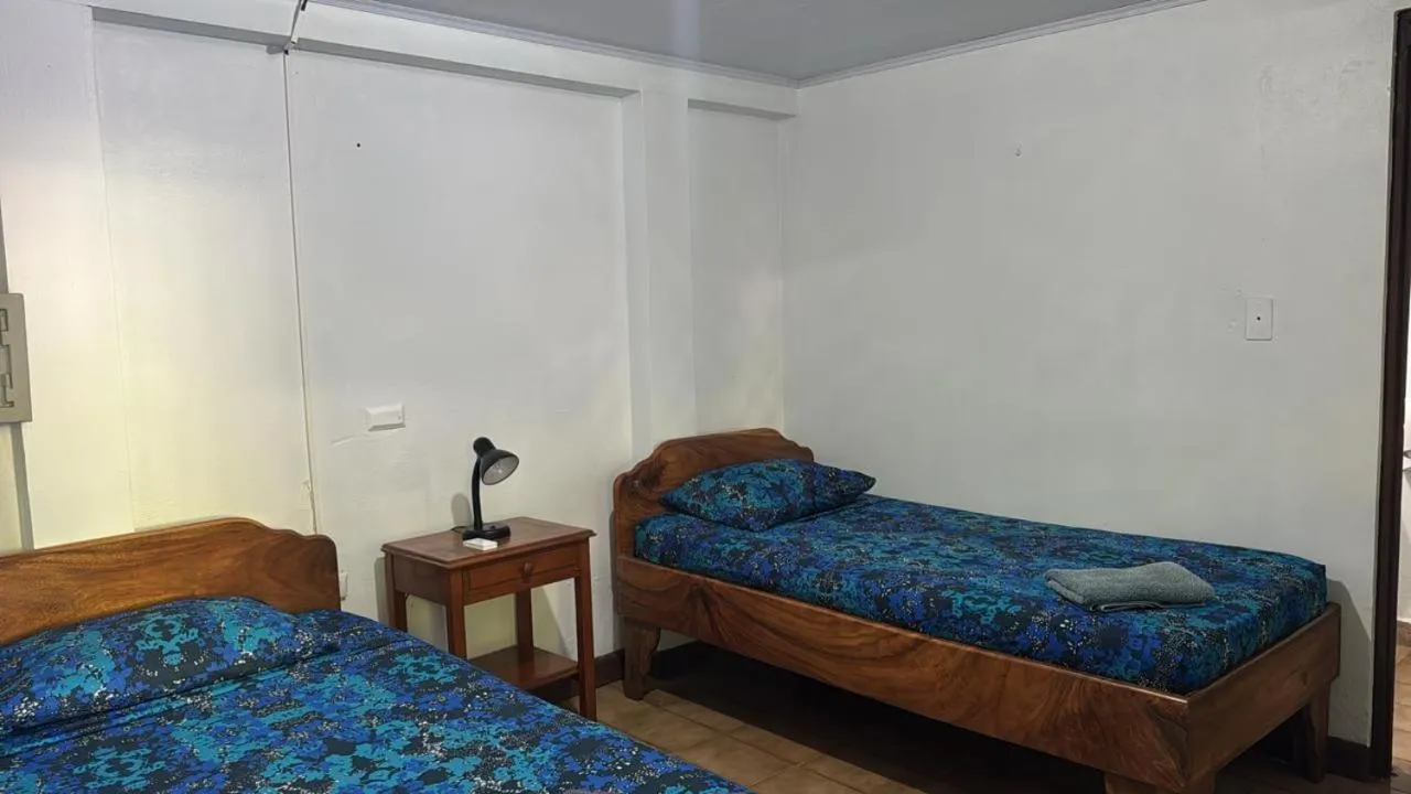 Bed in Hotel Marielos Tamarindo