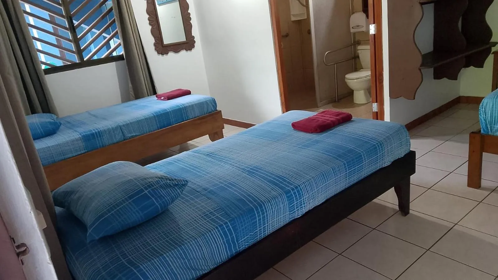 Bed in Hotel Marielos Tamarindo