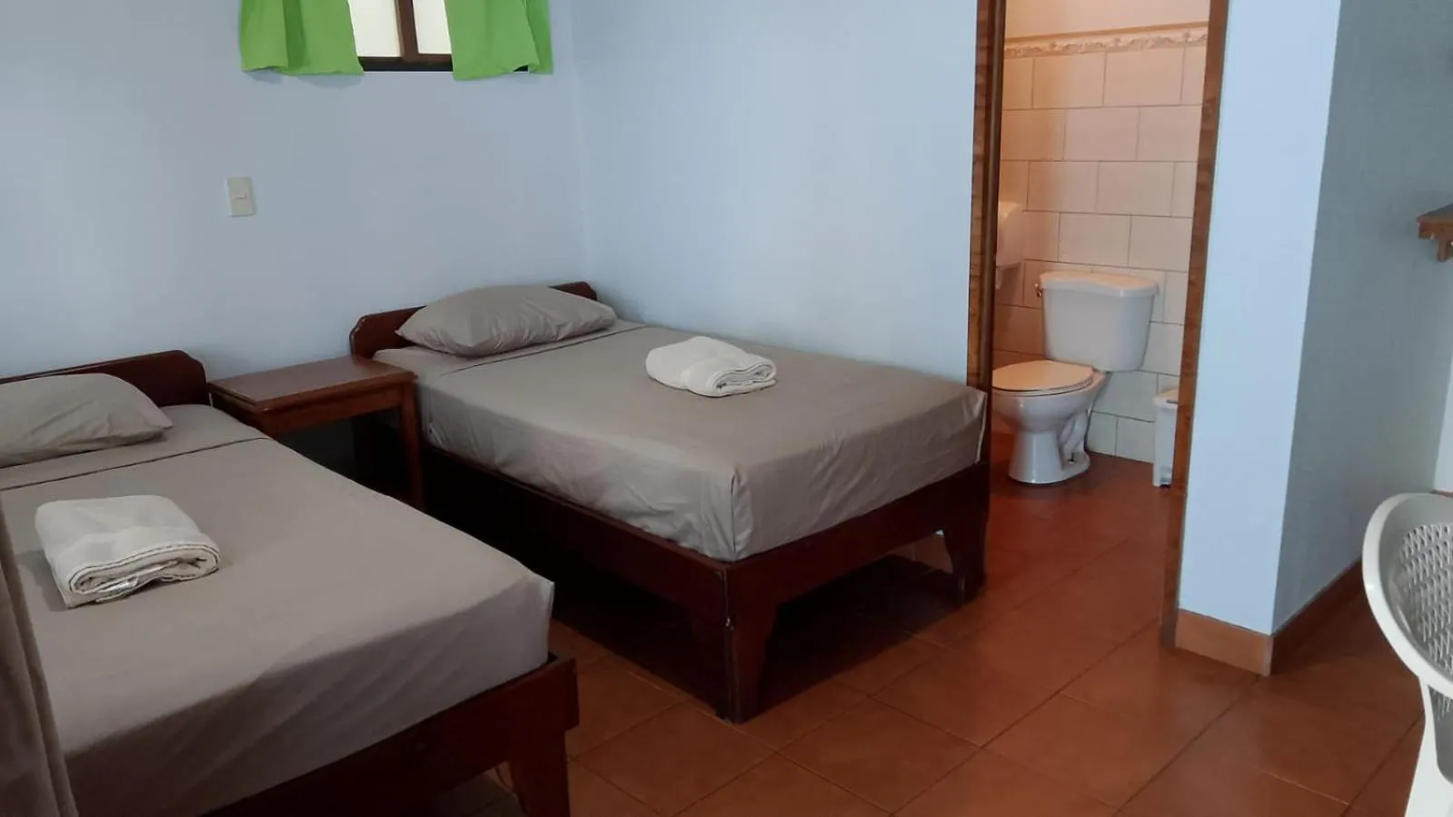 Bed in Hotel Marielos Tamarindo