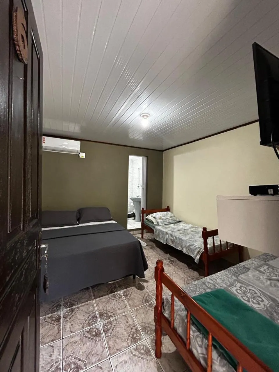 Bed in Pousada Toca da Ilha