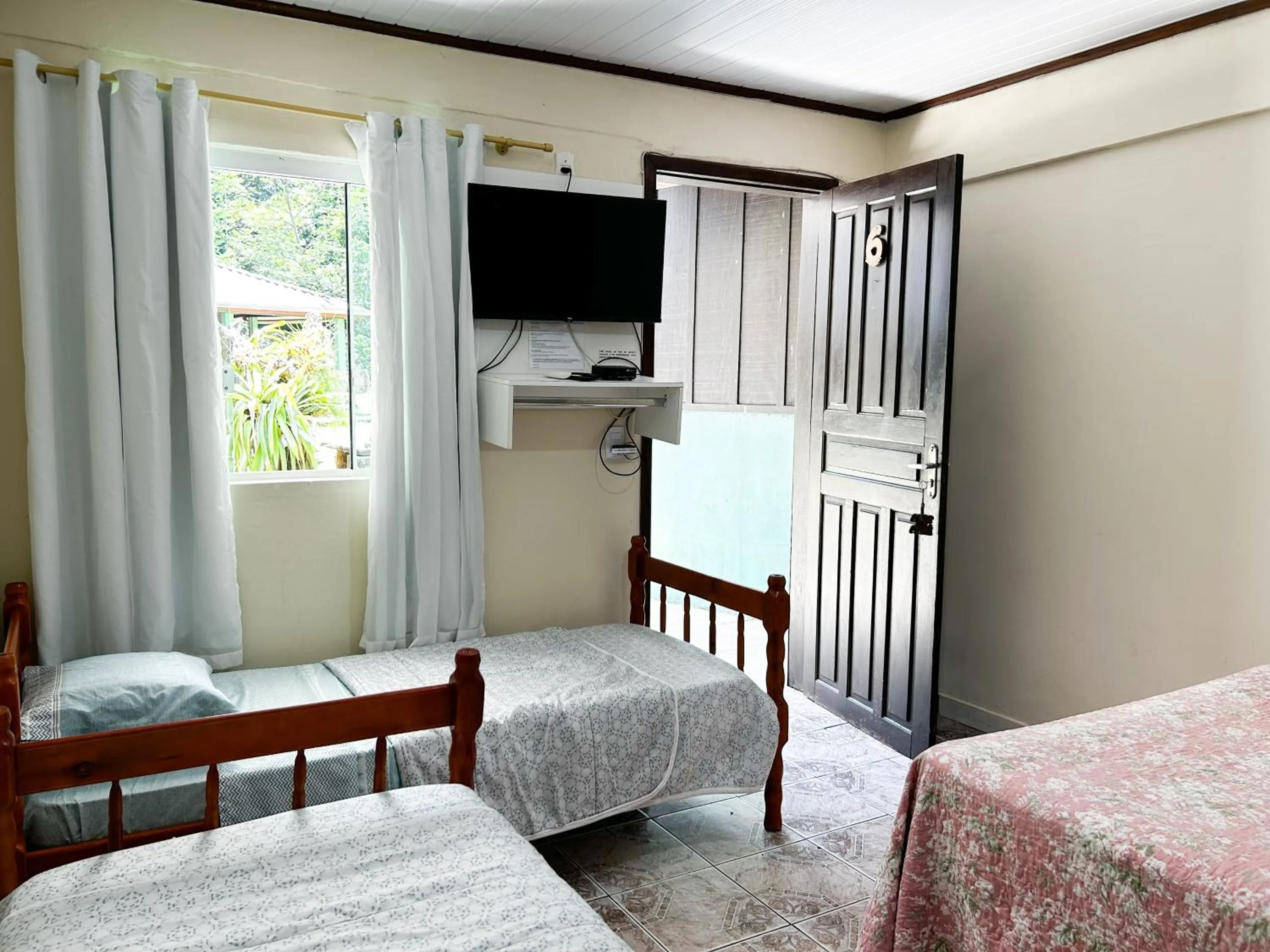 Bed in Pousada Toca da Ilha