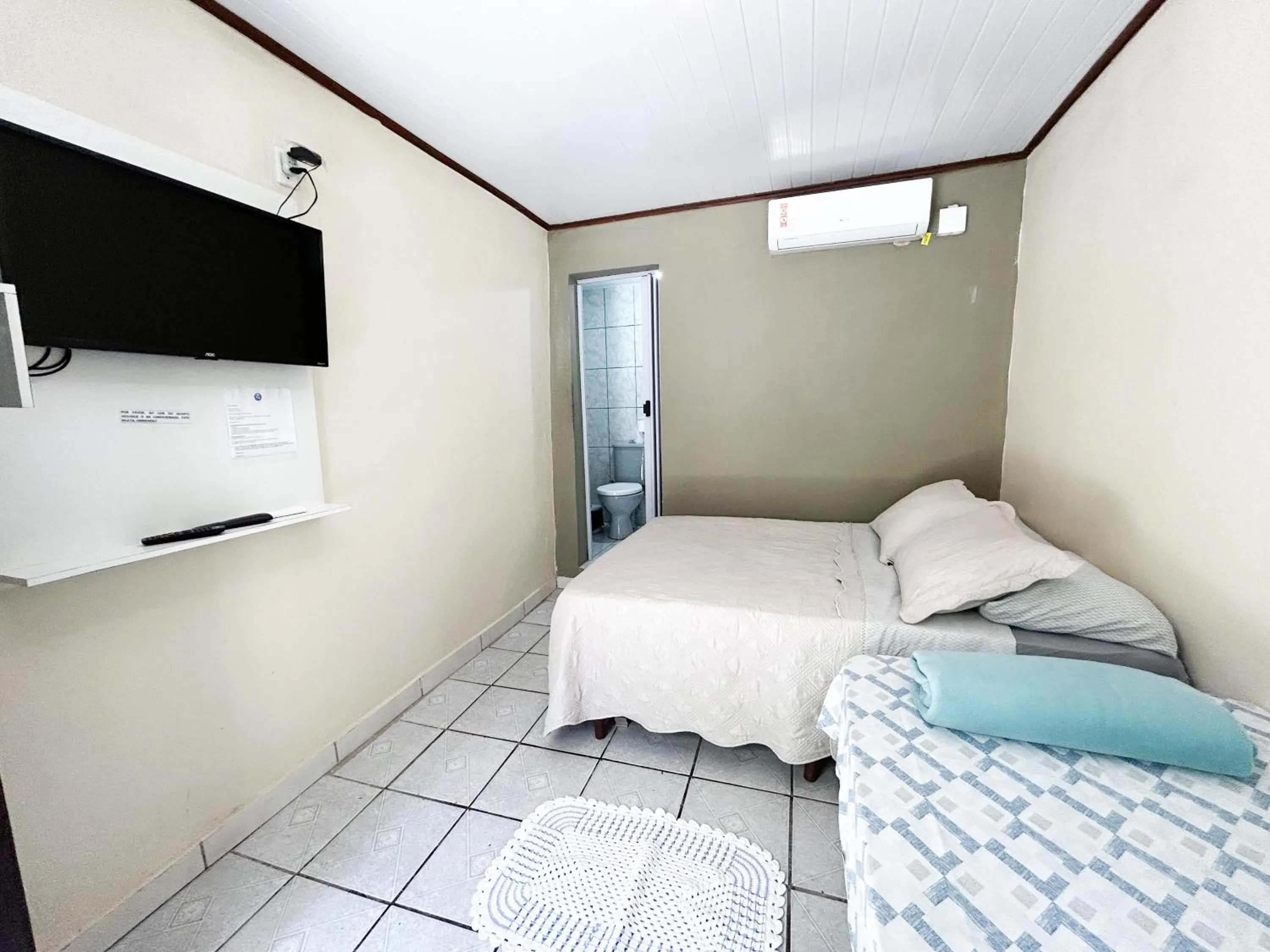 Bed in Pousada Toca da Ilha