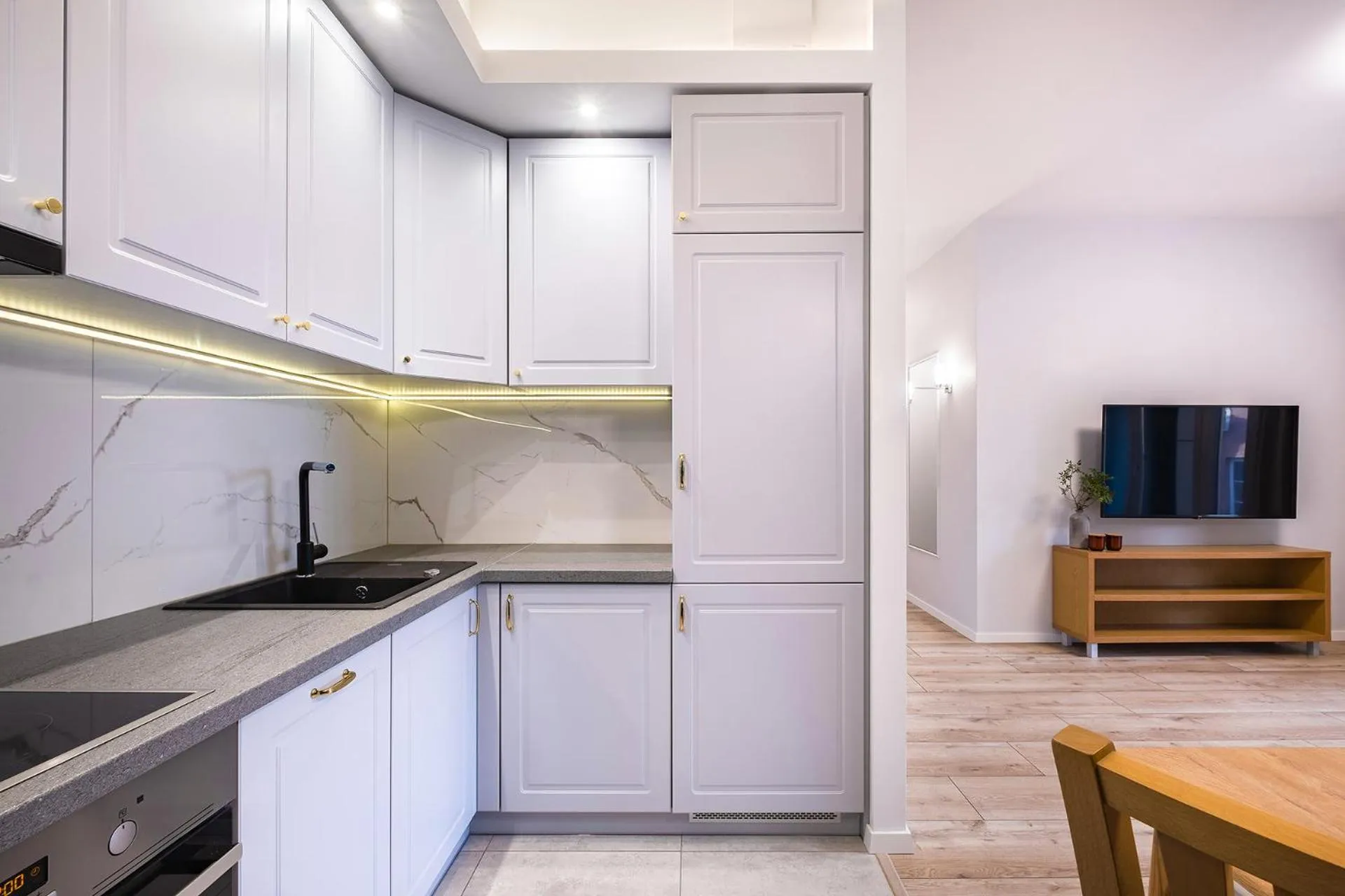 kitchen in Old Town by Welcome Apartment