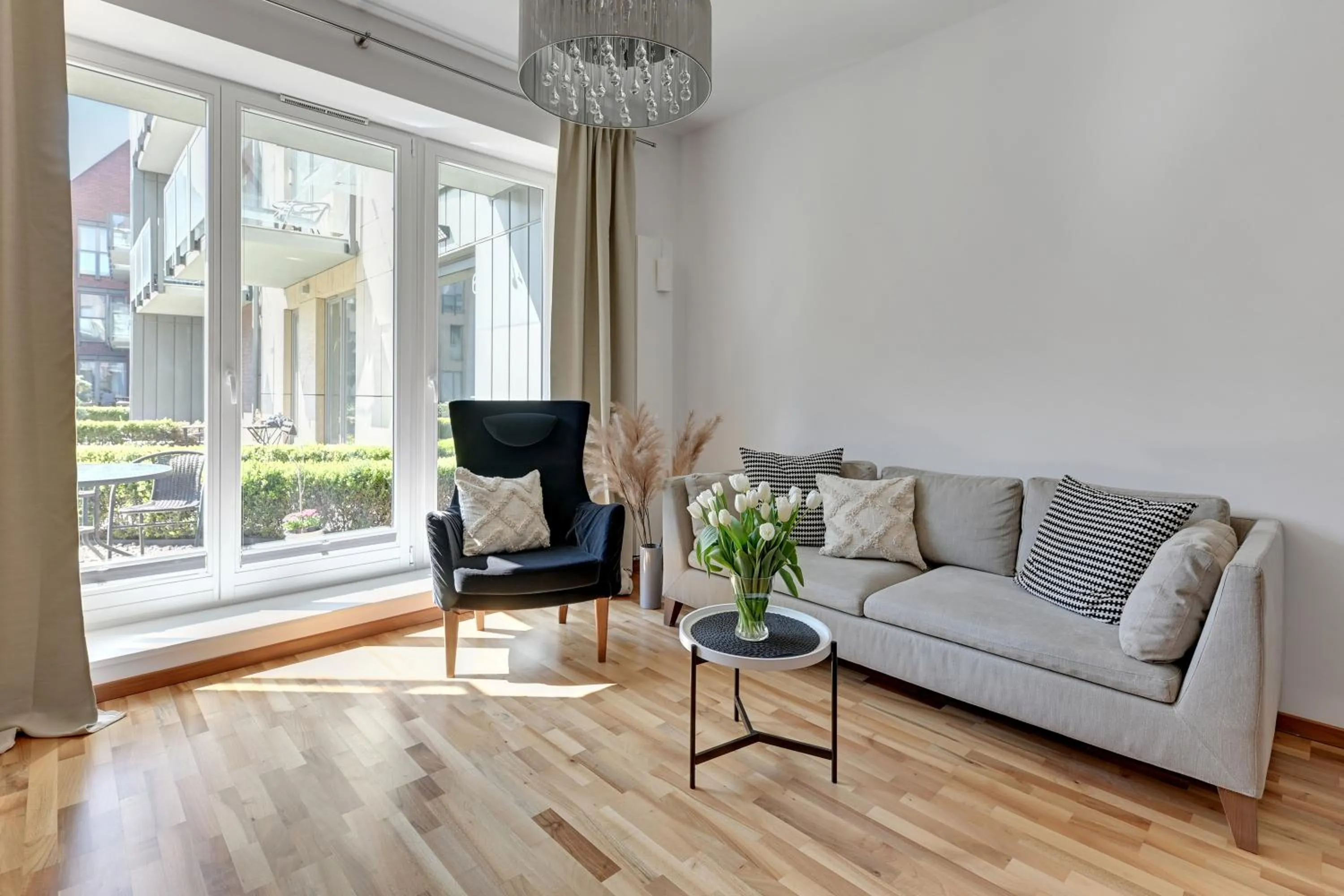 Living room in Old Town by Welcome Apartment