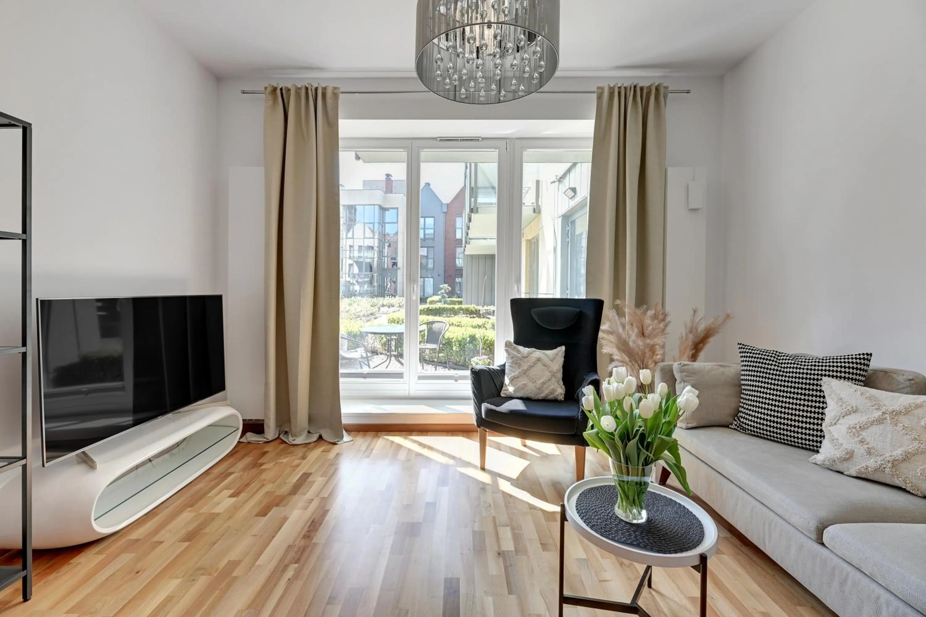 Living room in Old Town by Welcome Apartment