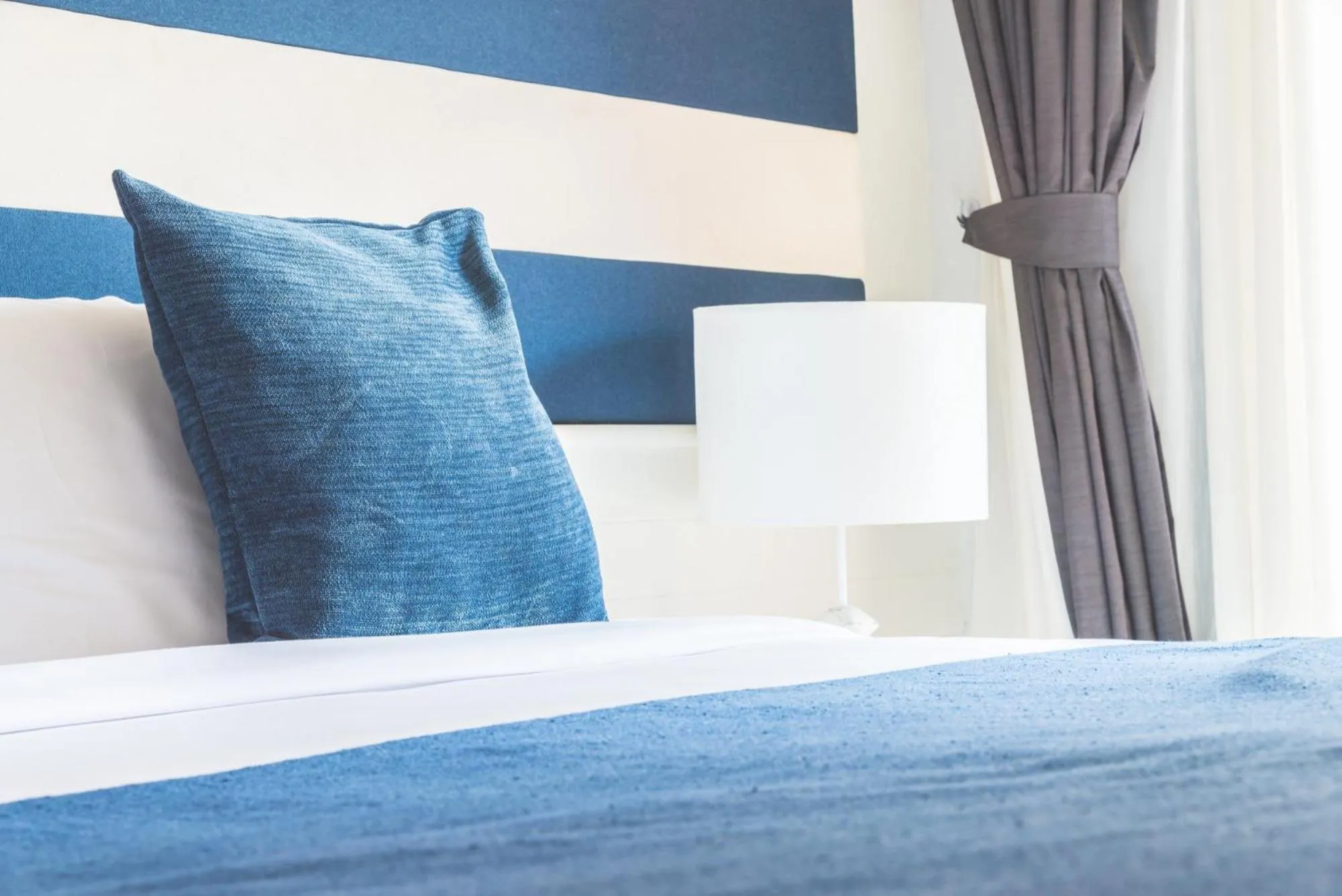 Bed in Ko Lanta Hotels and Working Space