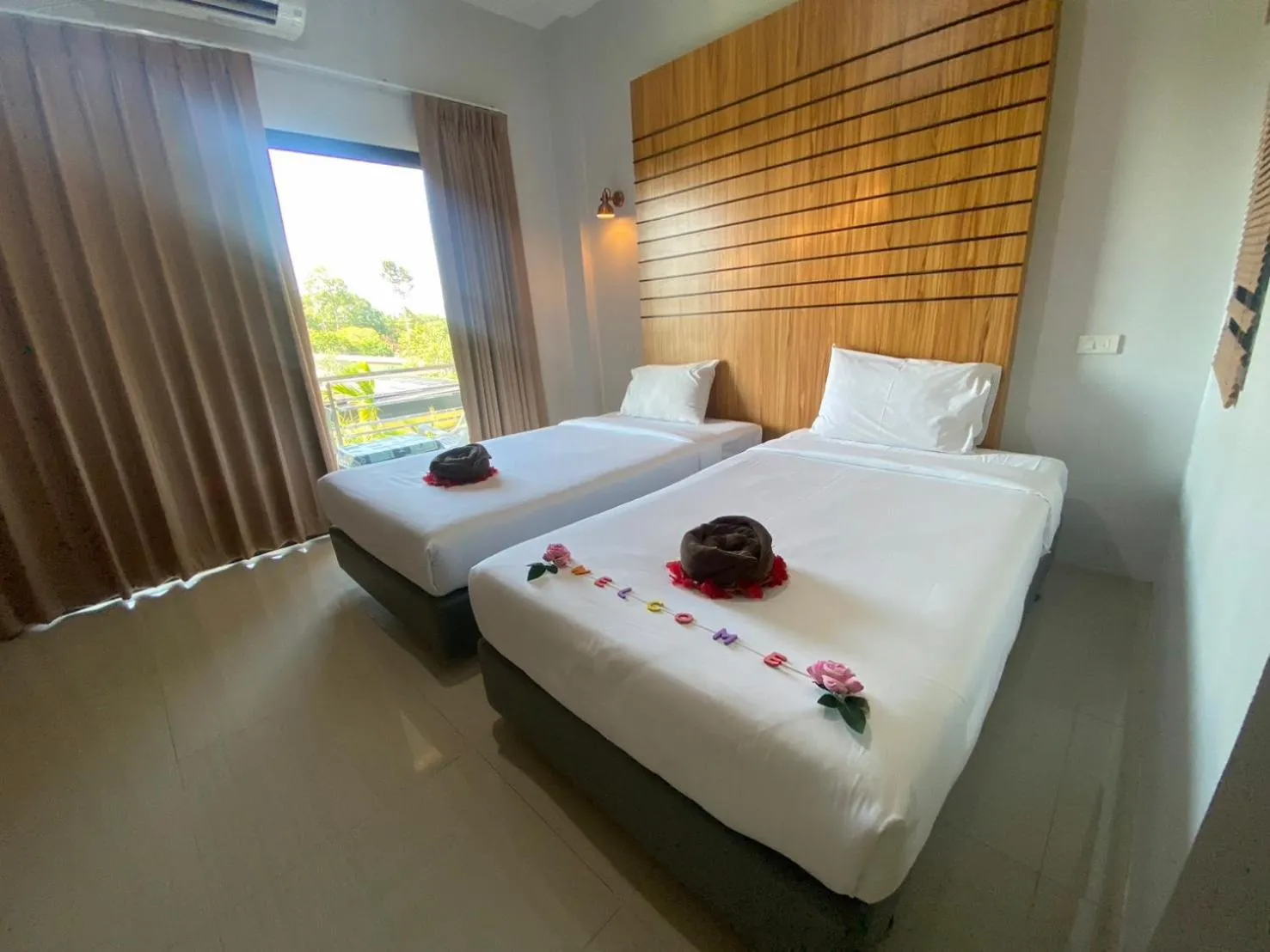 Bed in Rimnatee Resort Trang