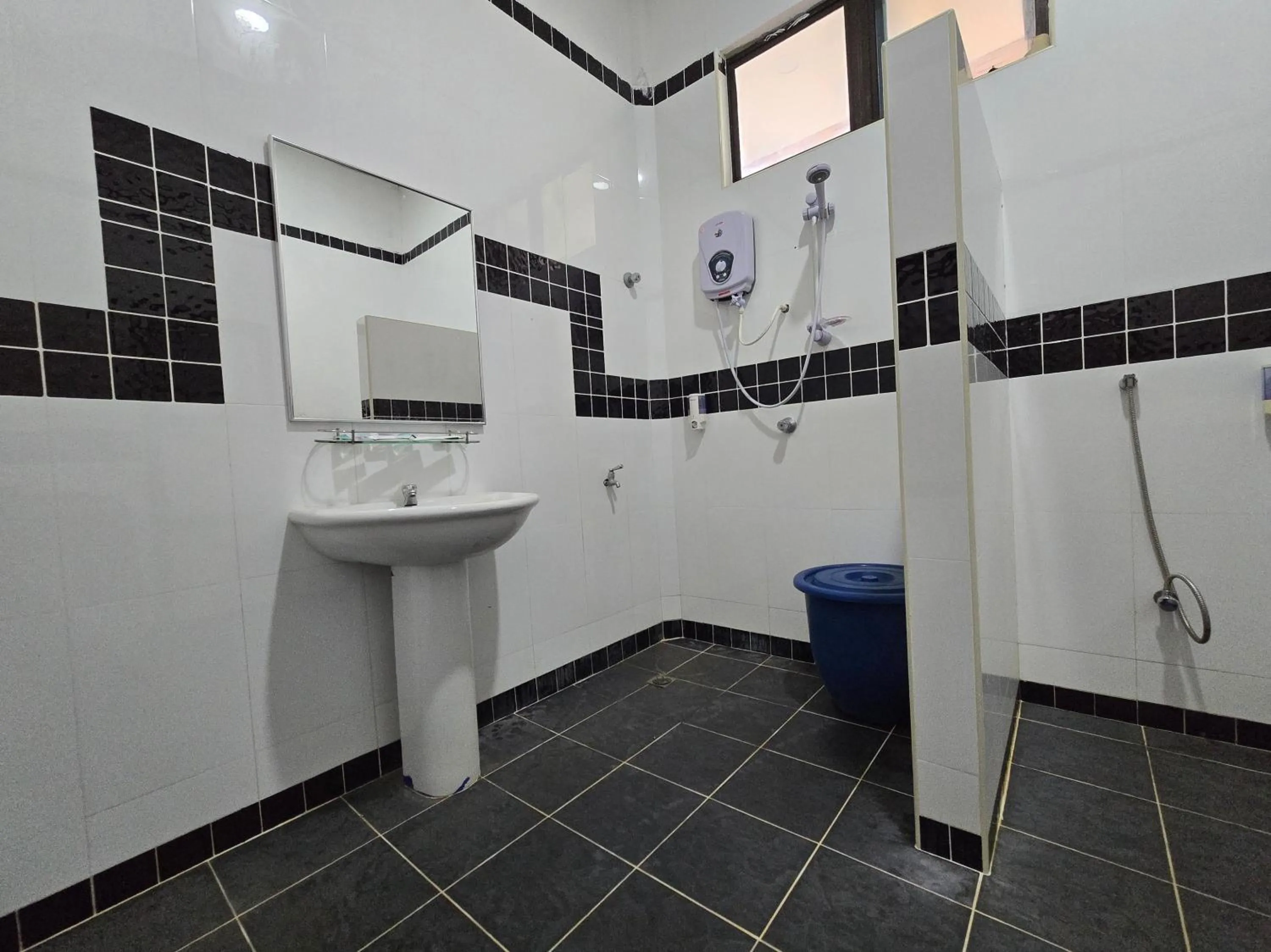 Bathroom in Hotel O Villa Impiana