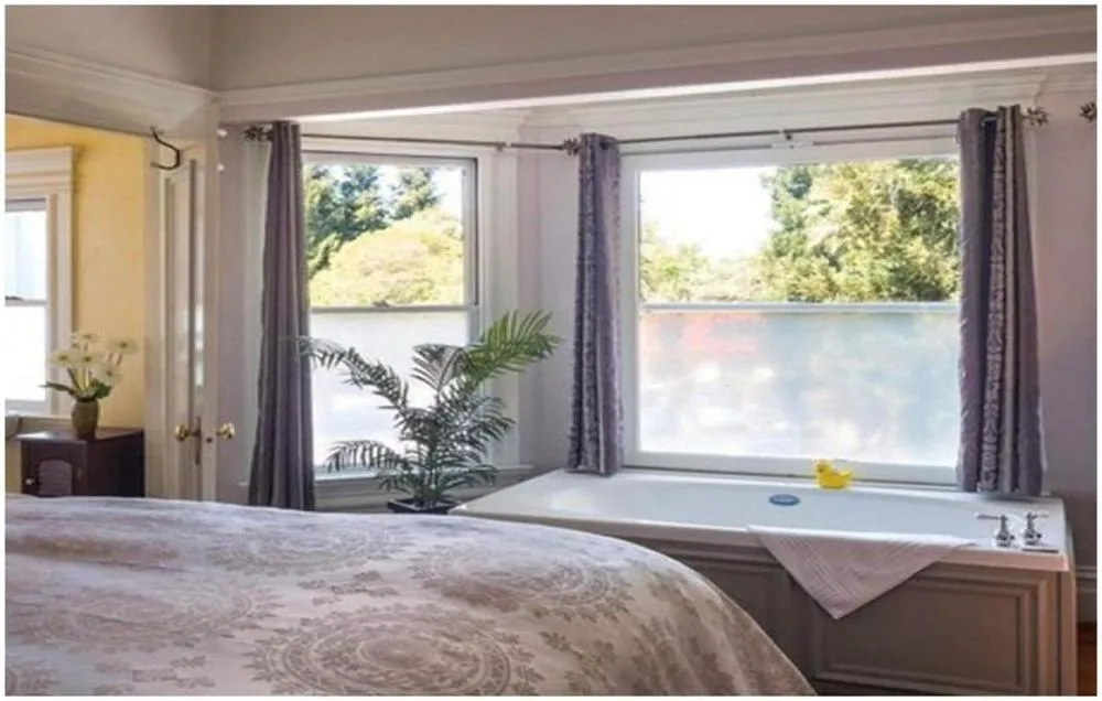 Bed in Cabernet House, an Old World Inn