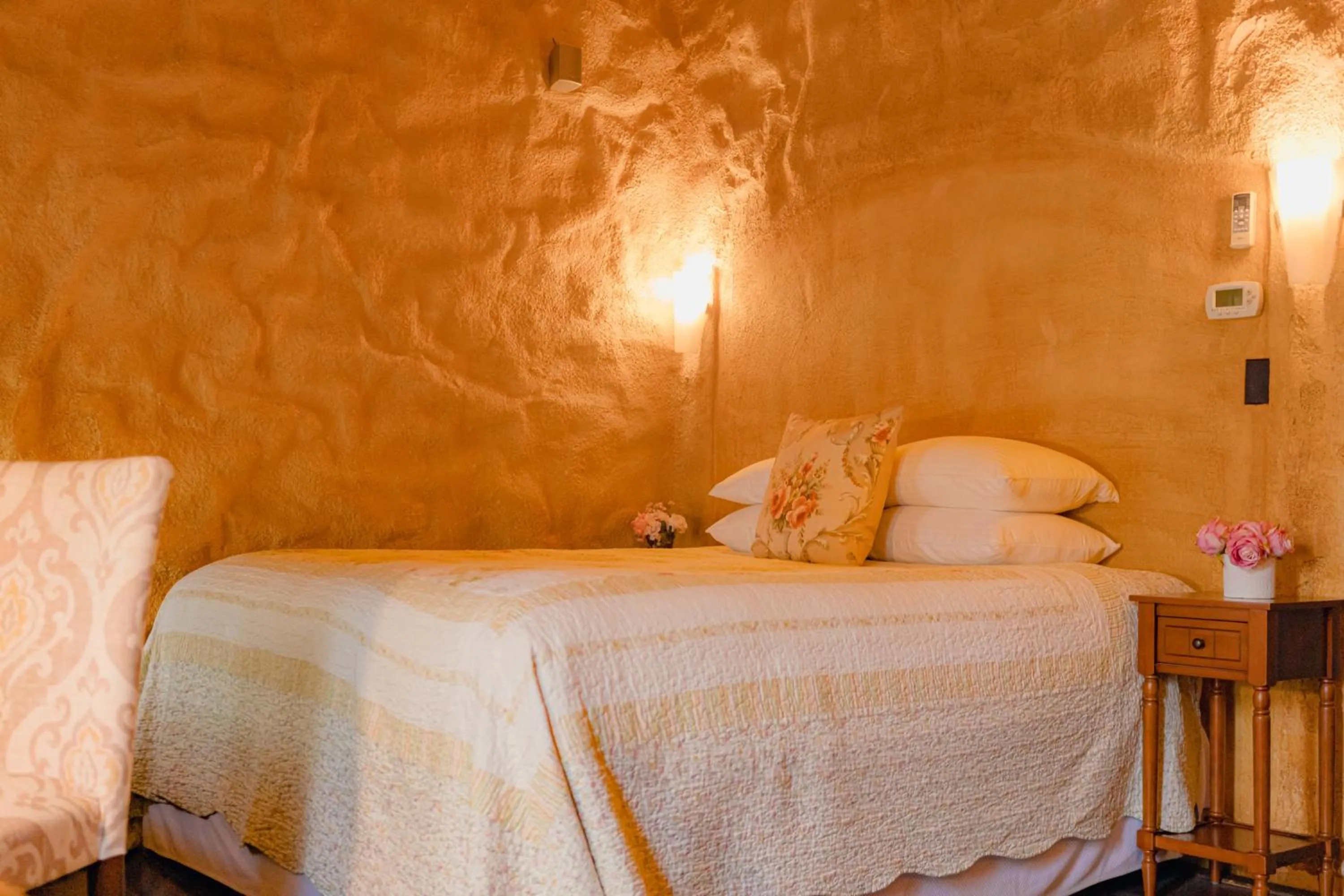 Bed in Cabernet House, an Old World Inn