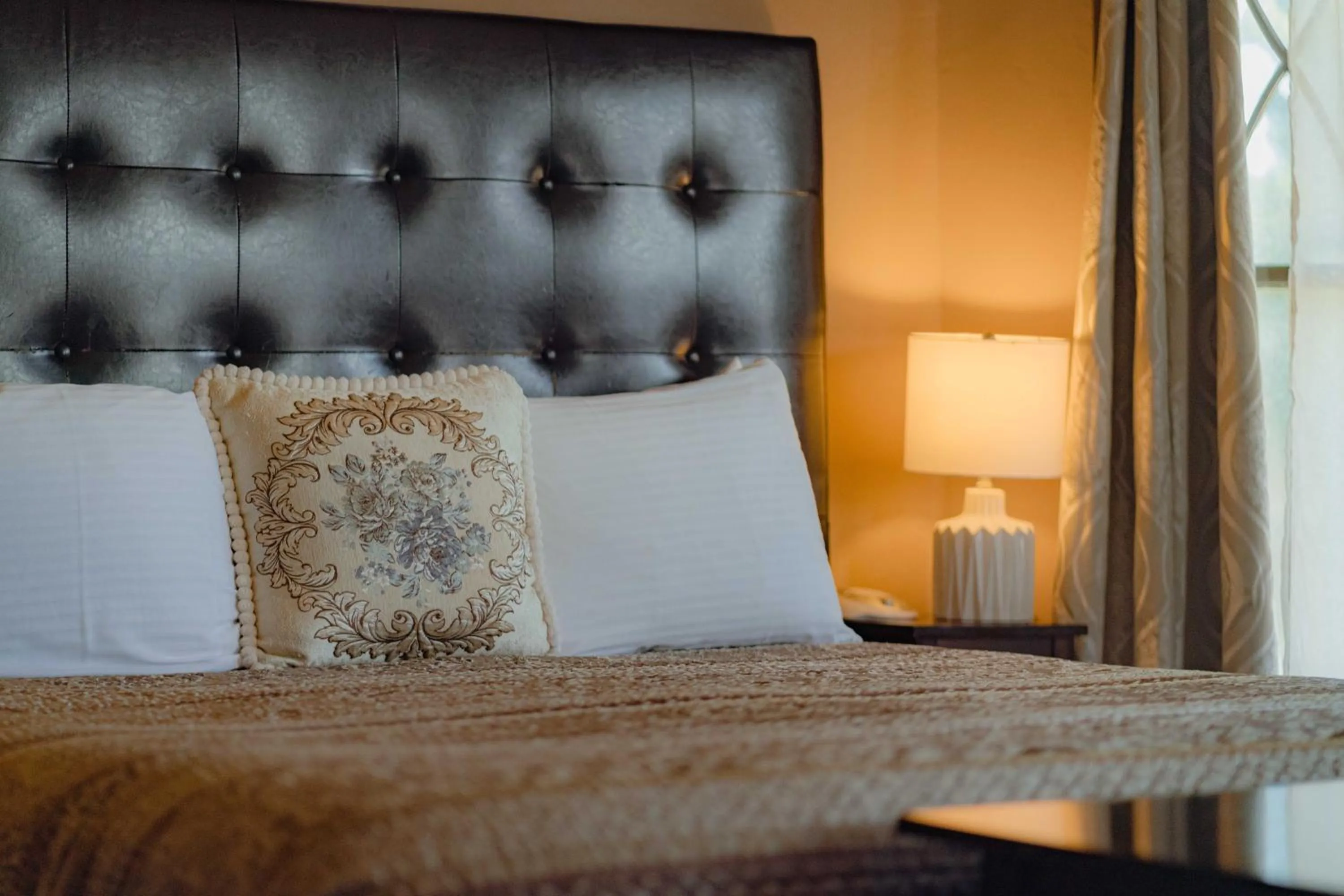 Bed in Cabernet House, an Old World Inn