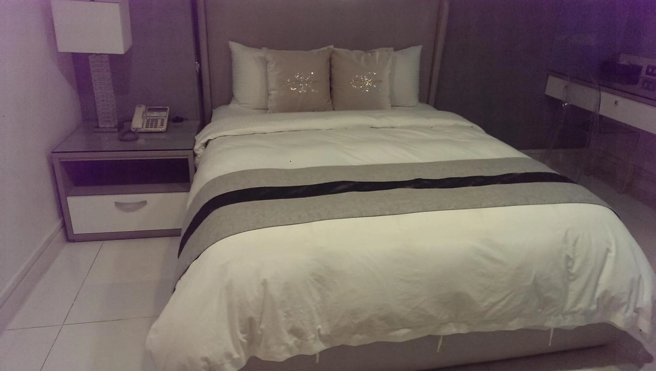 Bed in 花漾村聲民宿 歐舒丹洗沐 停車場