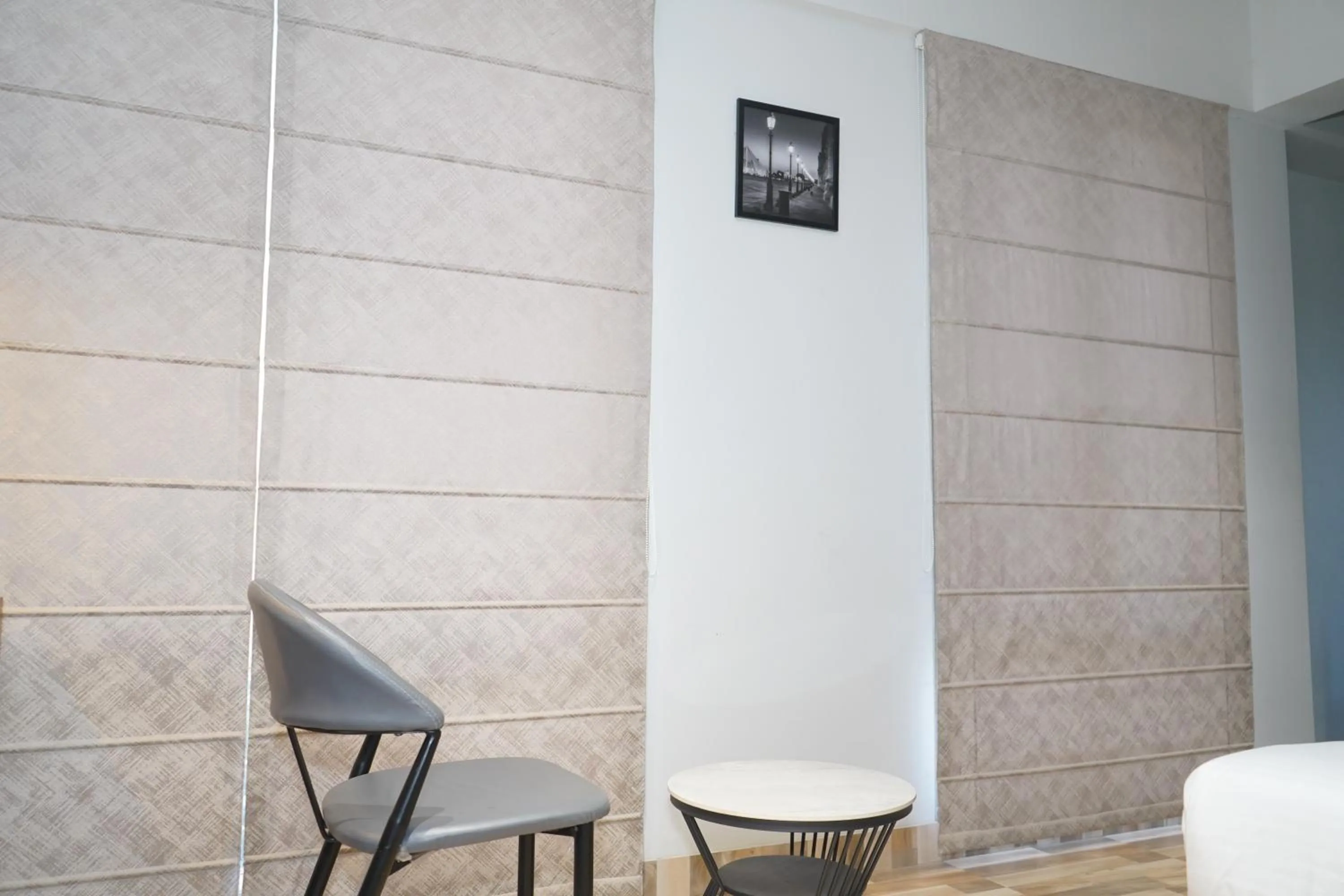 Seating area in Abssolute Homtel - Rooms & Suites