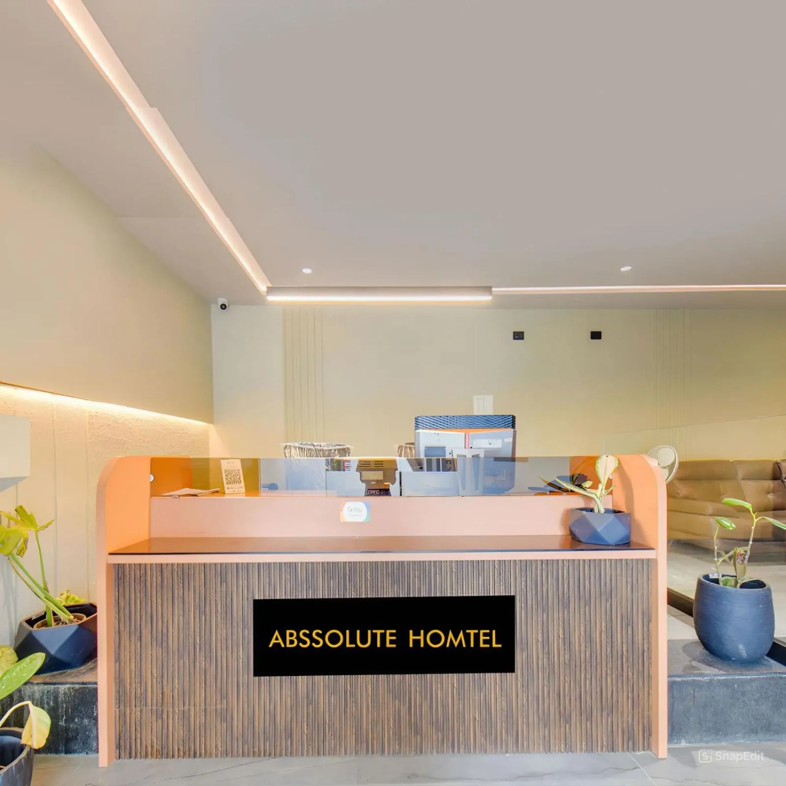 Seating area in Abssolute Homtel - Rooms & Suites