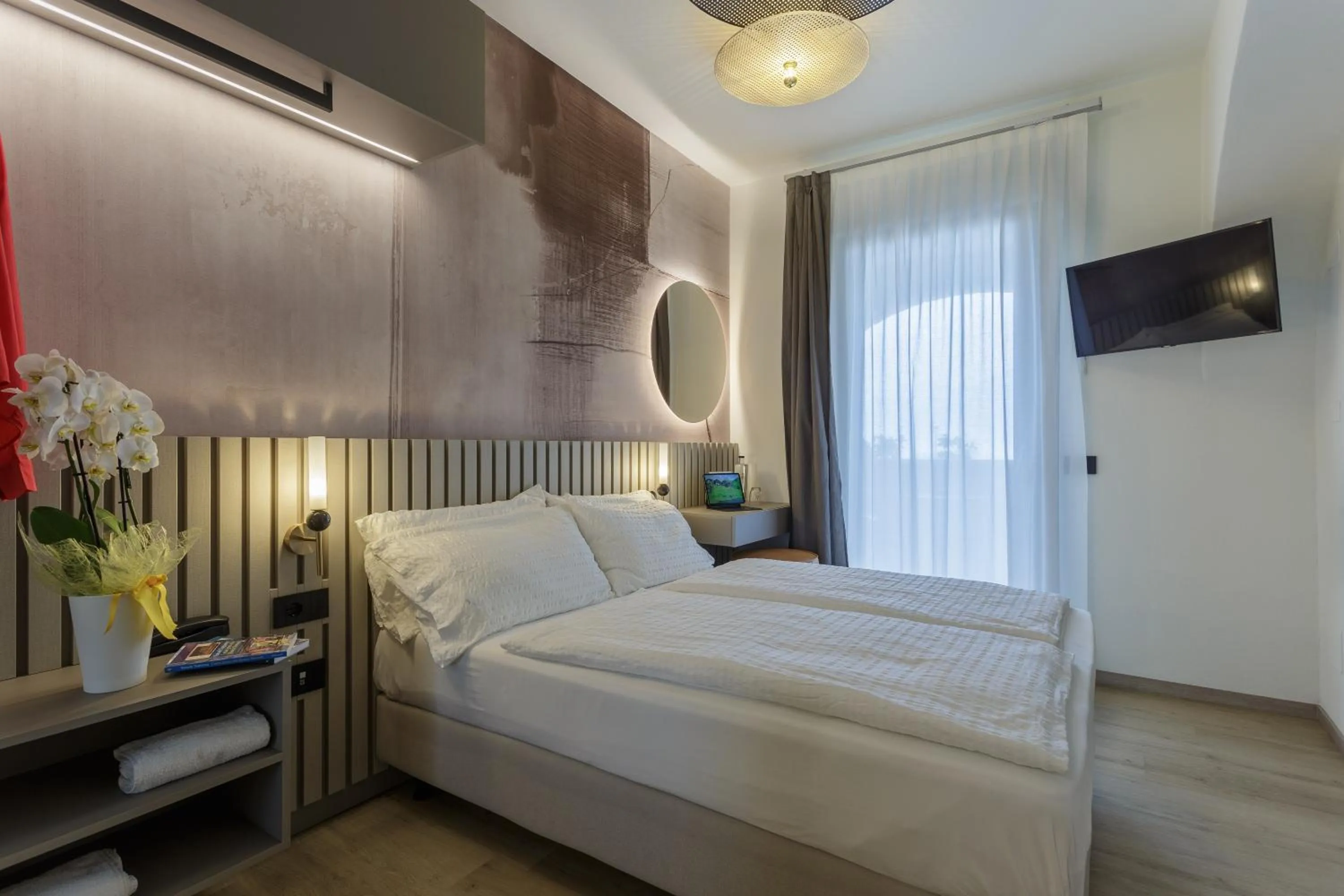 Bed in Hotel Veronesi