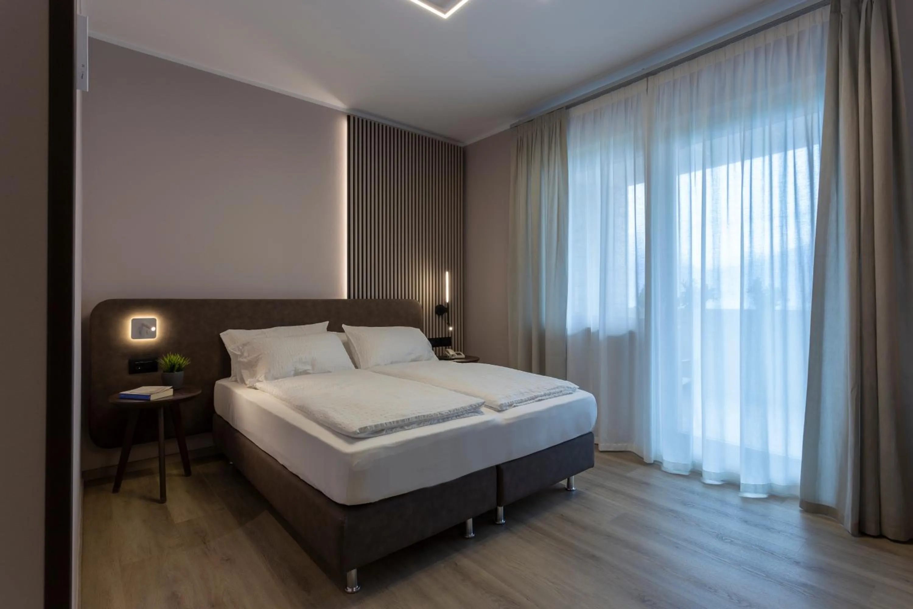 Bed in Hotel Veronesi