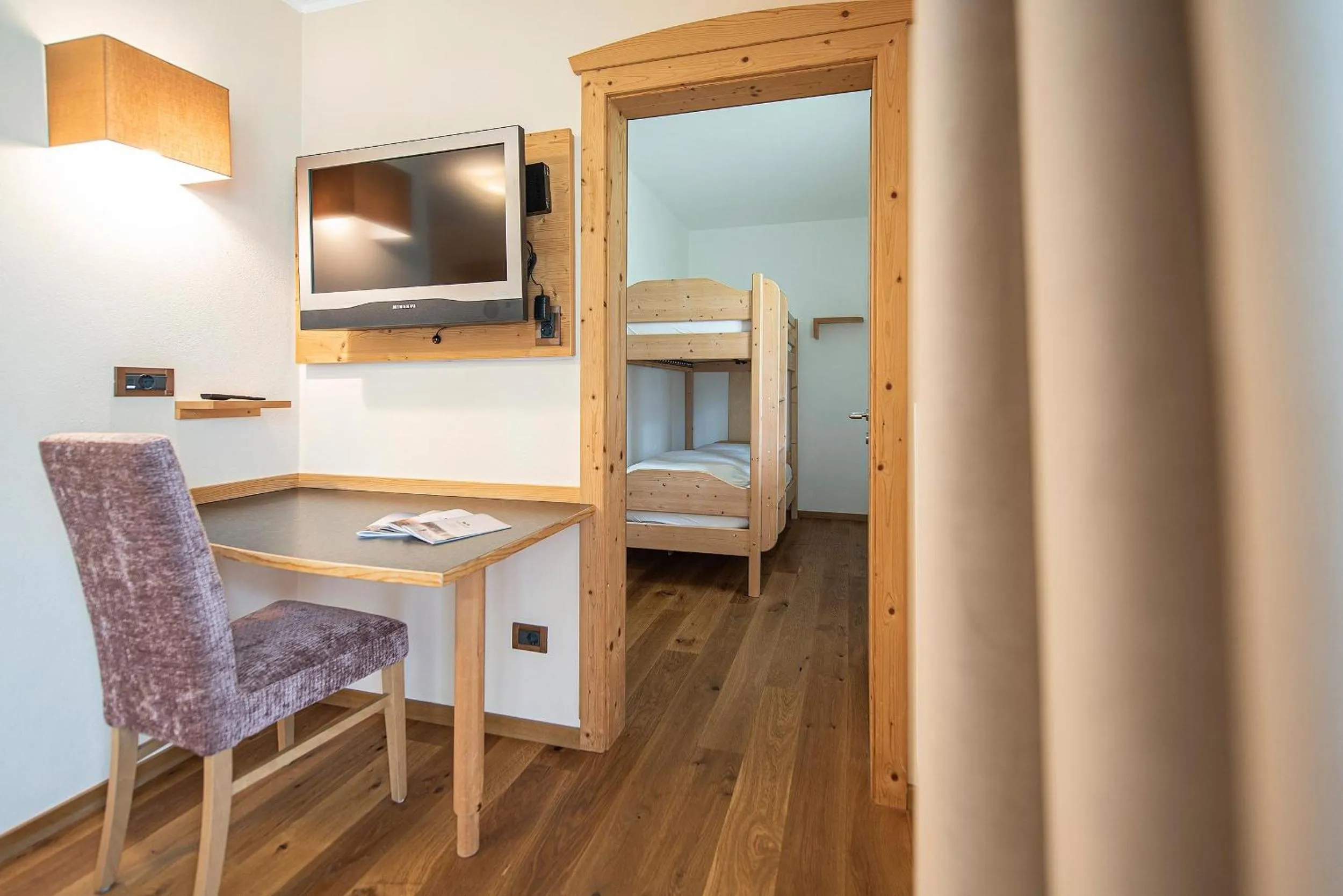 Communal lounge/ TV room, Bed in Vitalpina Hotel Waldhof