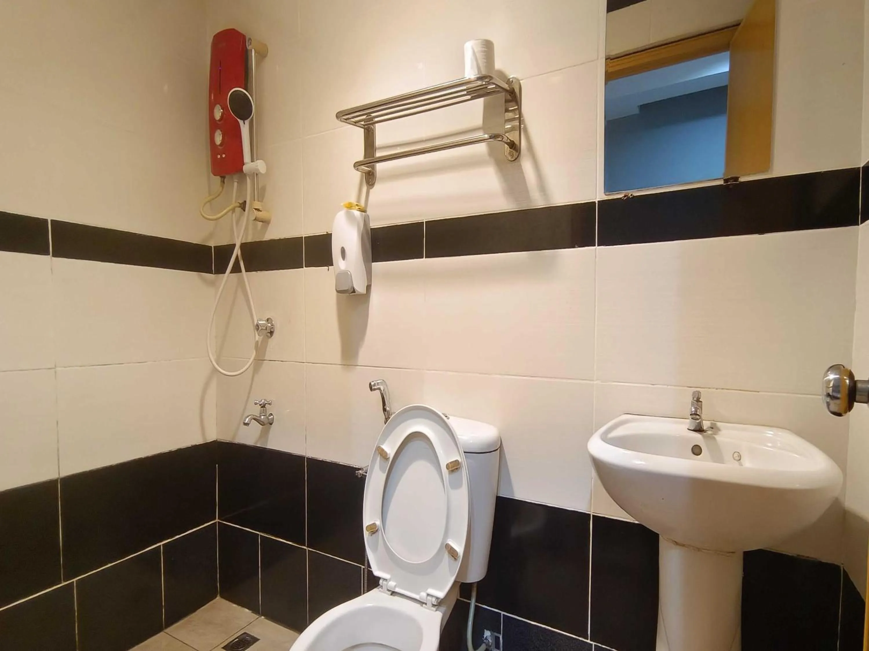 Bathroom in Hotel O Rainfield Inn