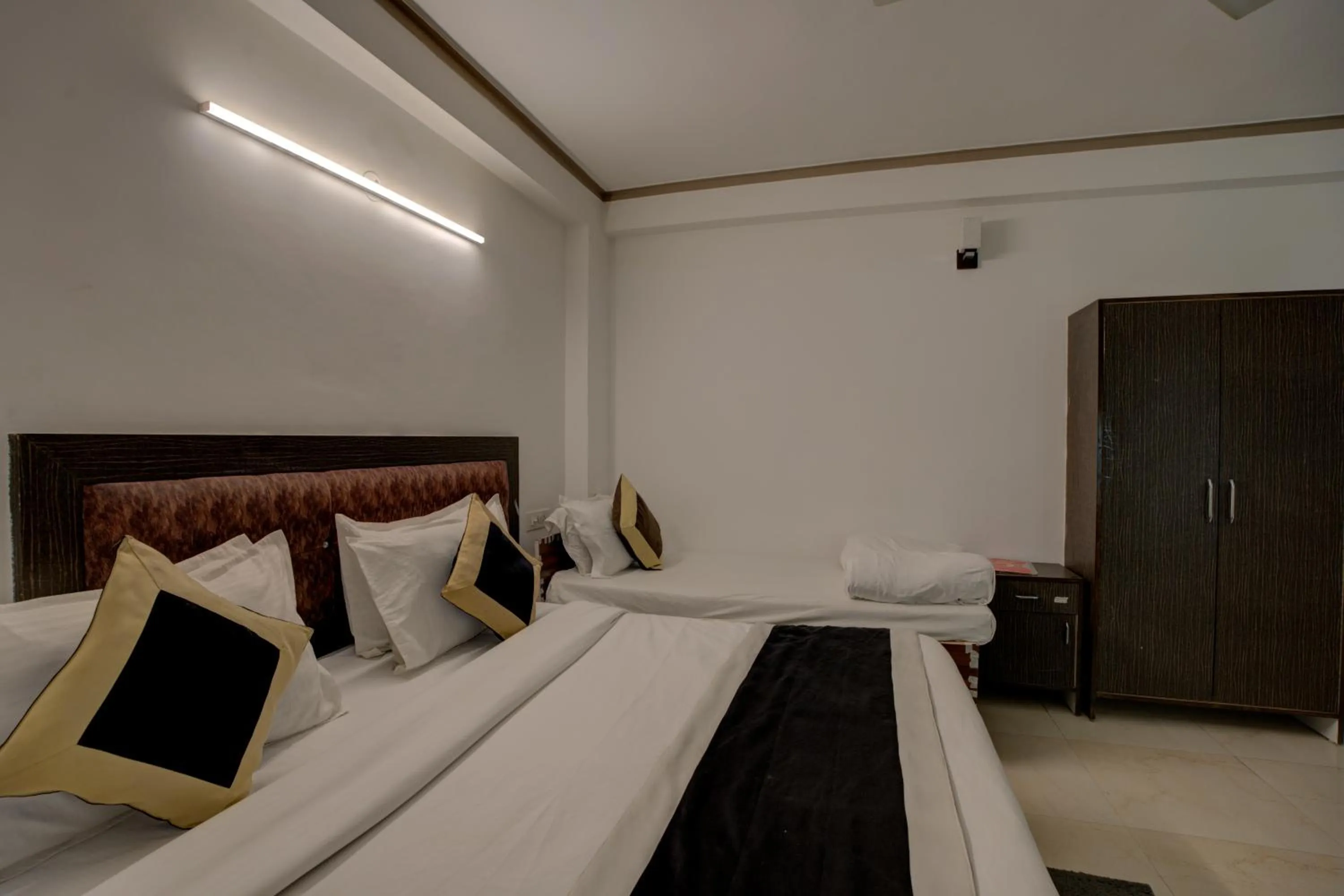 Bed in Hotel Dolphin at Delhi Airport