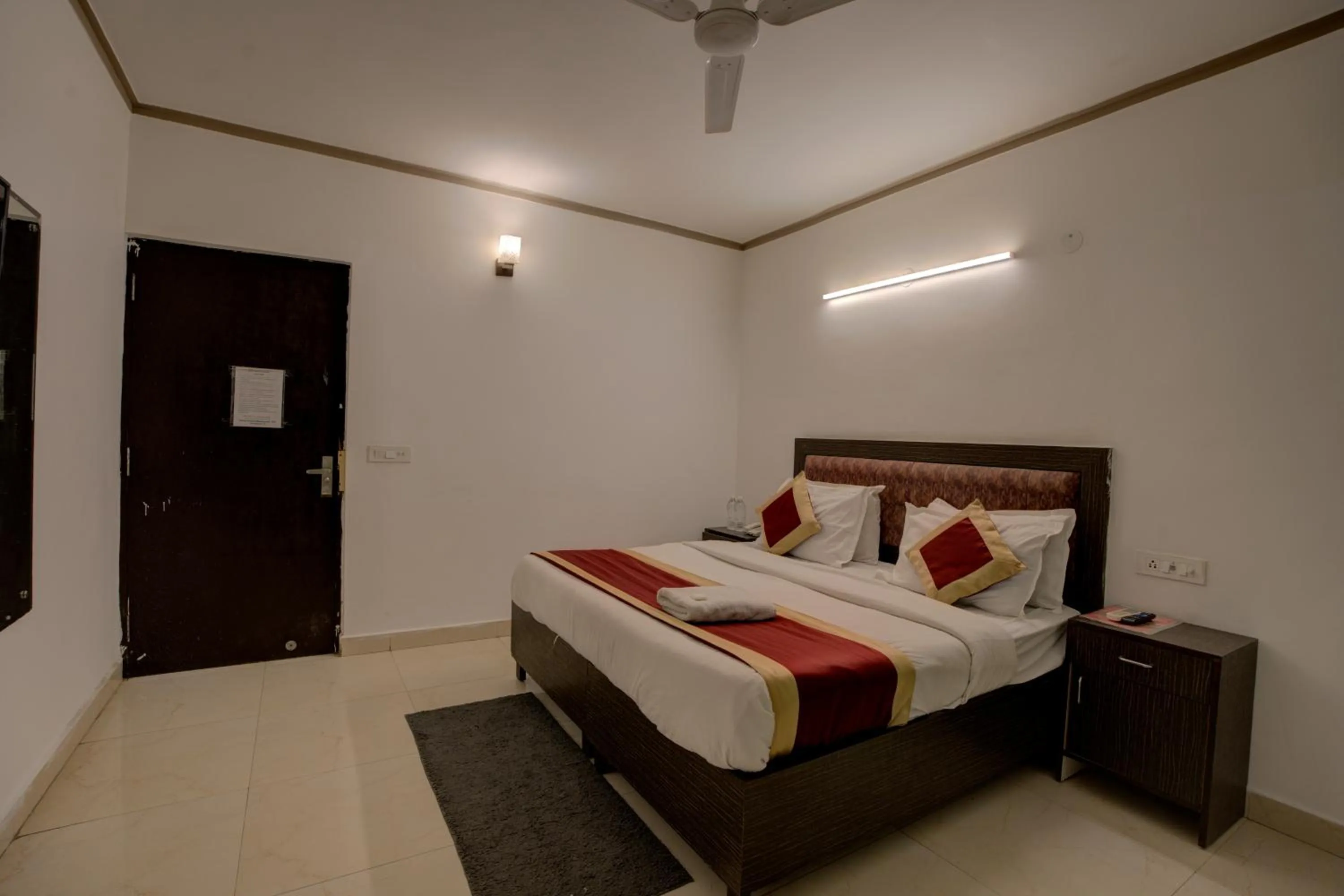 Bed in Hotel Dolphin at Delhi Airport