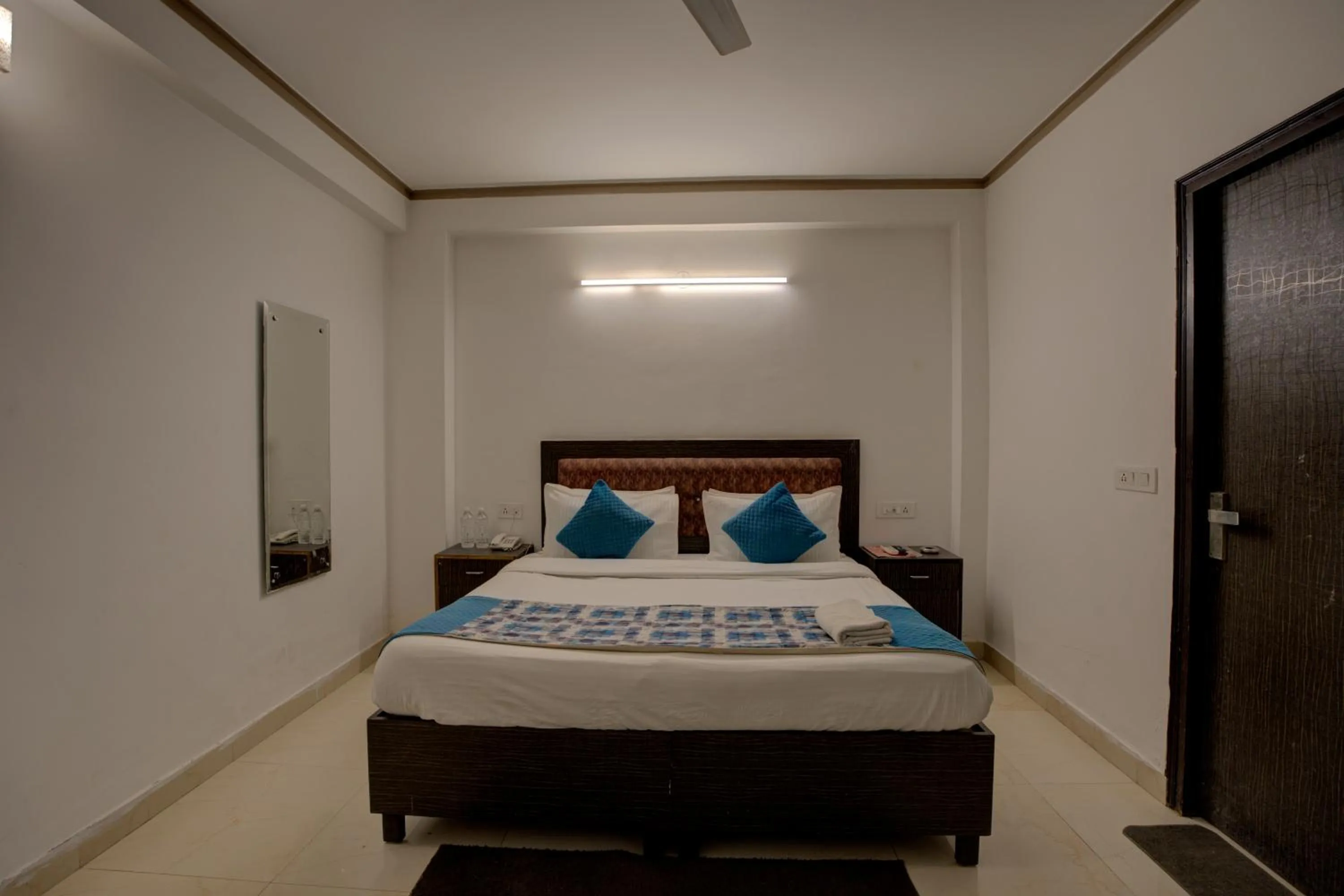 Bed in Hotel Dolphin at Delhi Airport