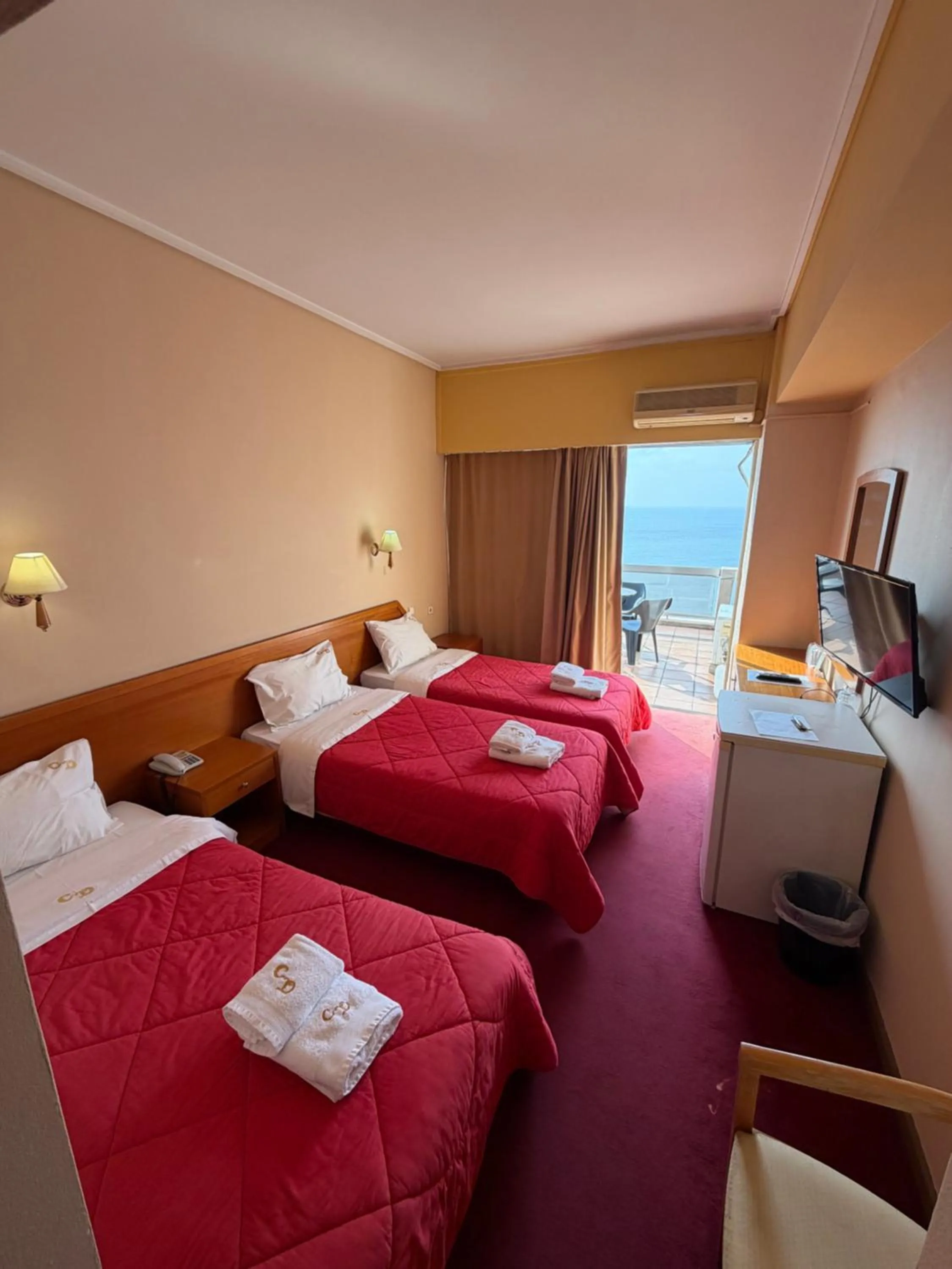 Photo of the whole room, Bed in Cavo D' Oro